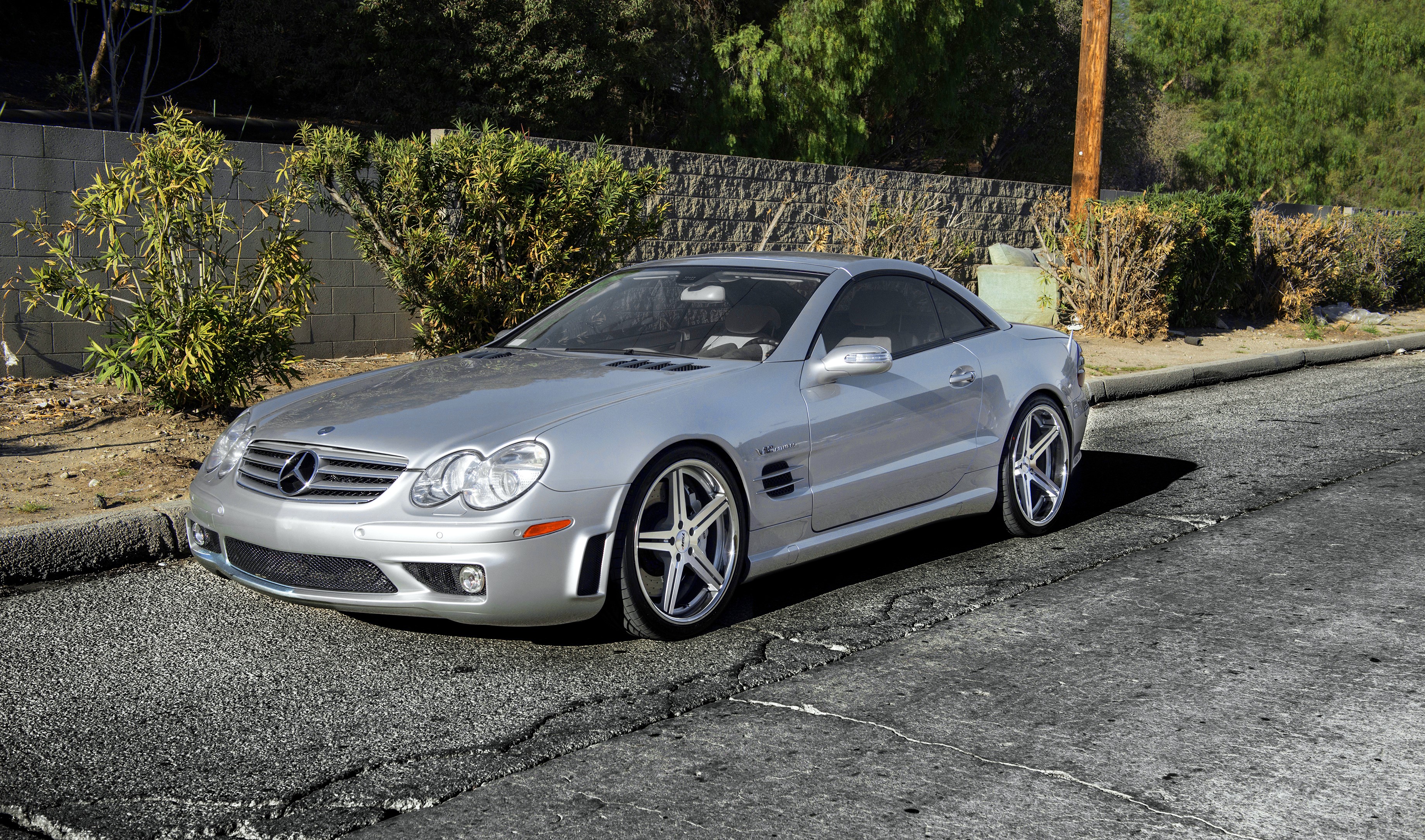 Silver Mercedes-Benz SL65 parked on a street HD Wallpaper