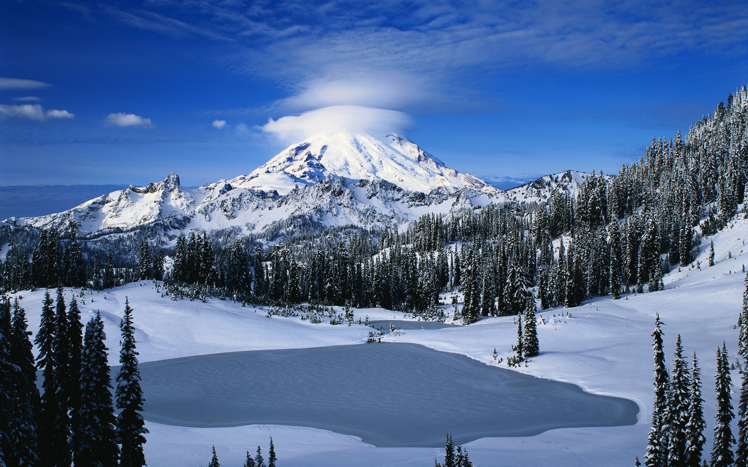 Snowy Mountains with Pine Trees and Frozen Lake HD Wallpaper