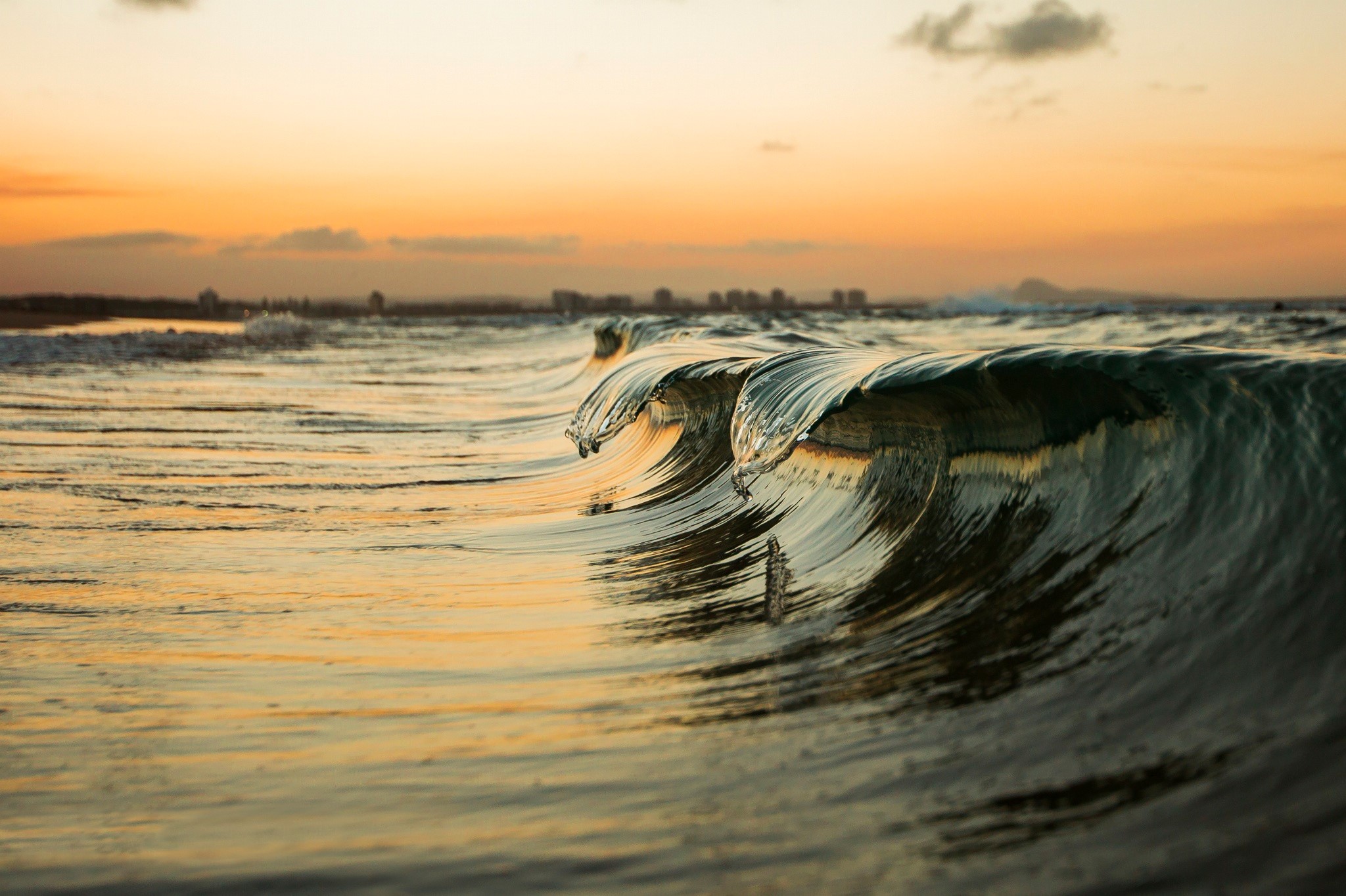 Ocean wave at sunset HD Wallpaper