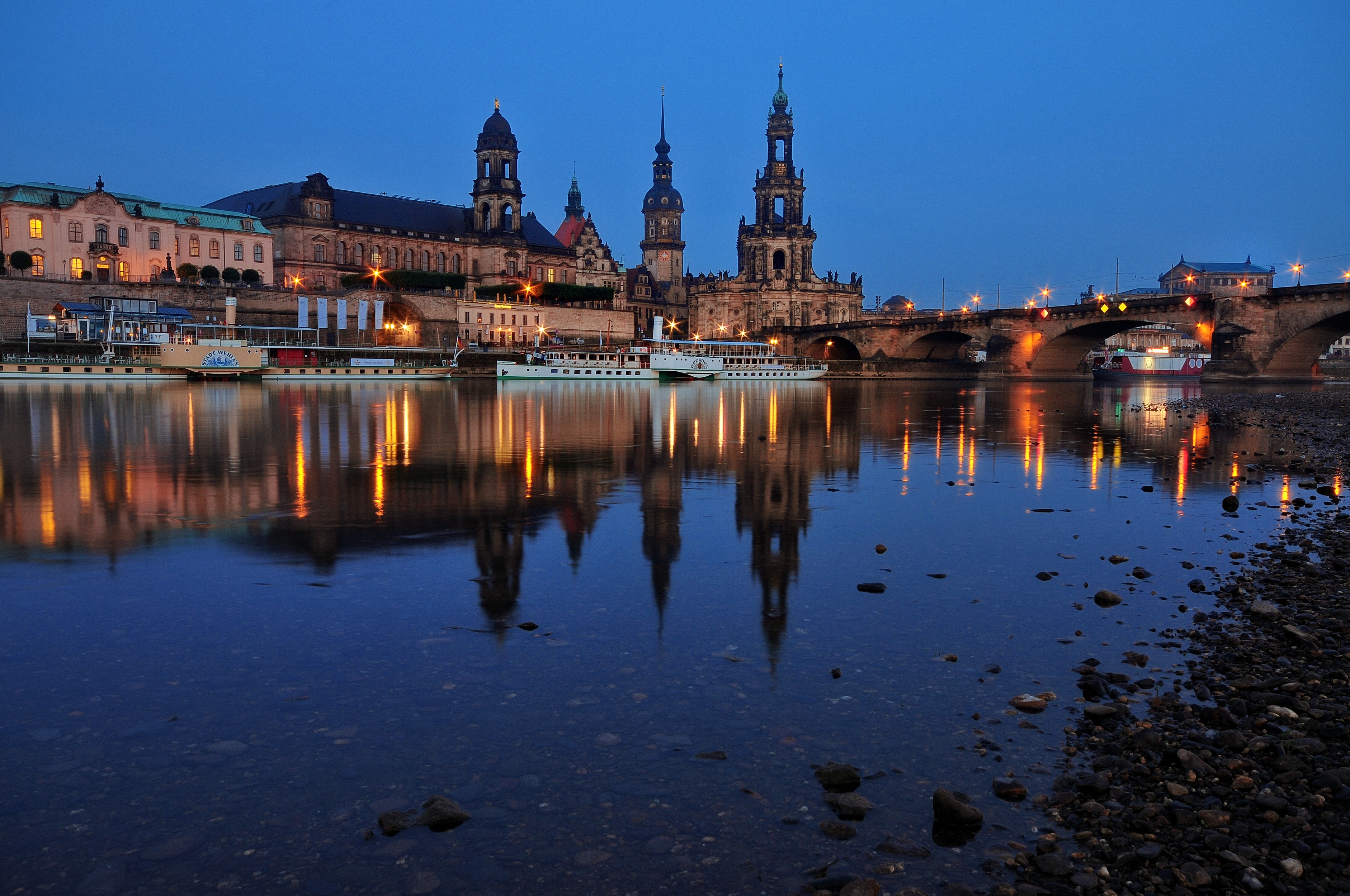 Dresden skyline with Elbe River and bridge at night HD Wallpaper
