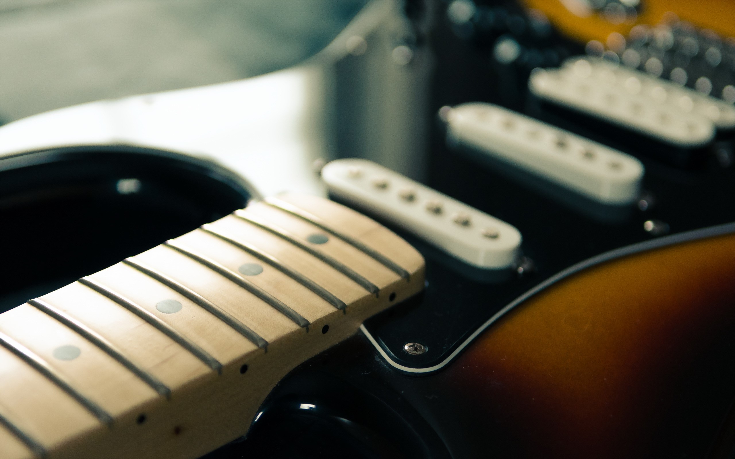 Closeup of an electric guitar neck and pickups HD Wallpaper
