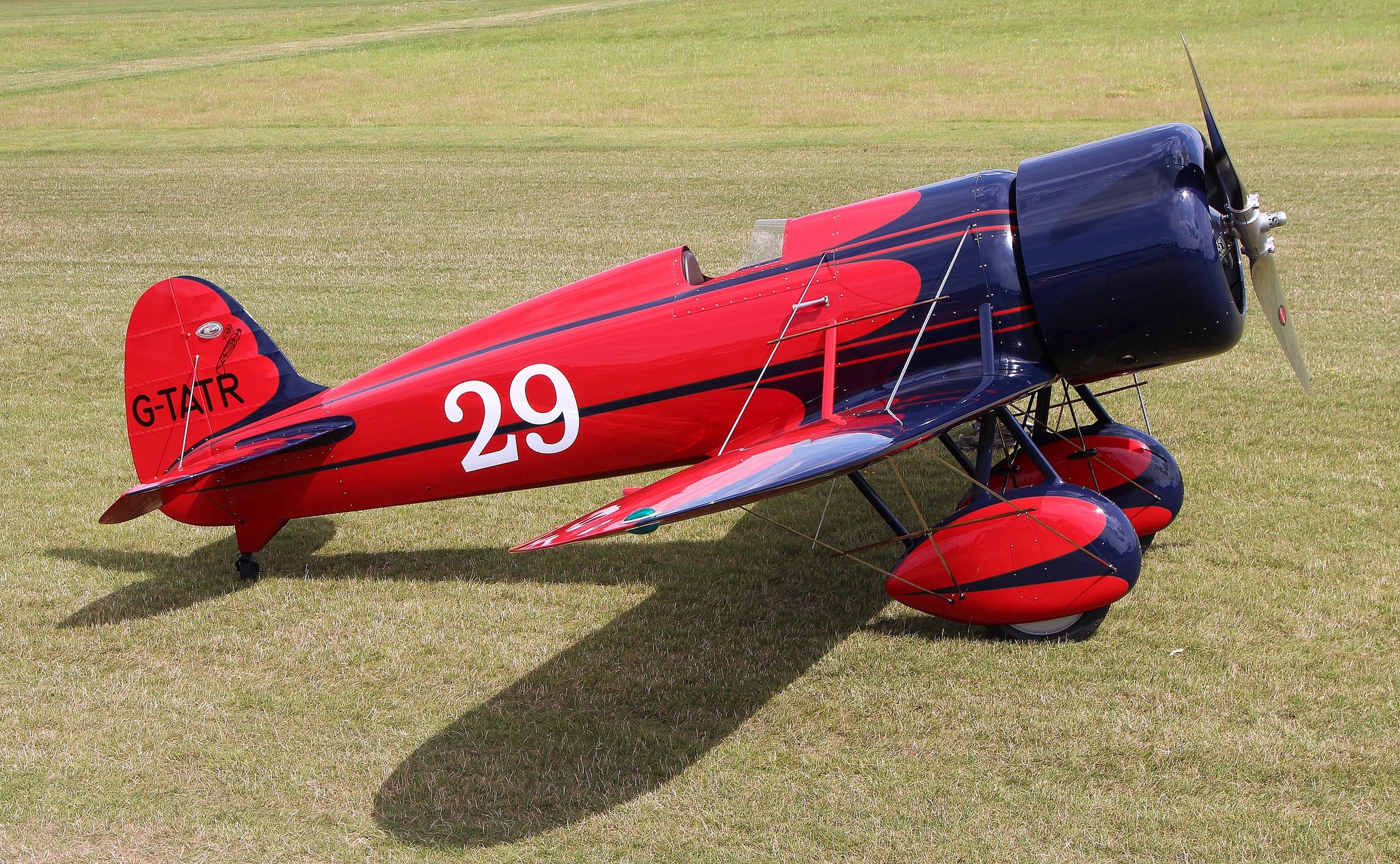 Red and blue vintage airplane with number 29 HD Wallpaper