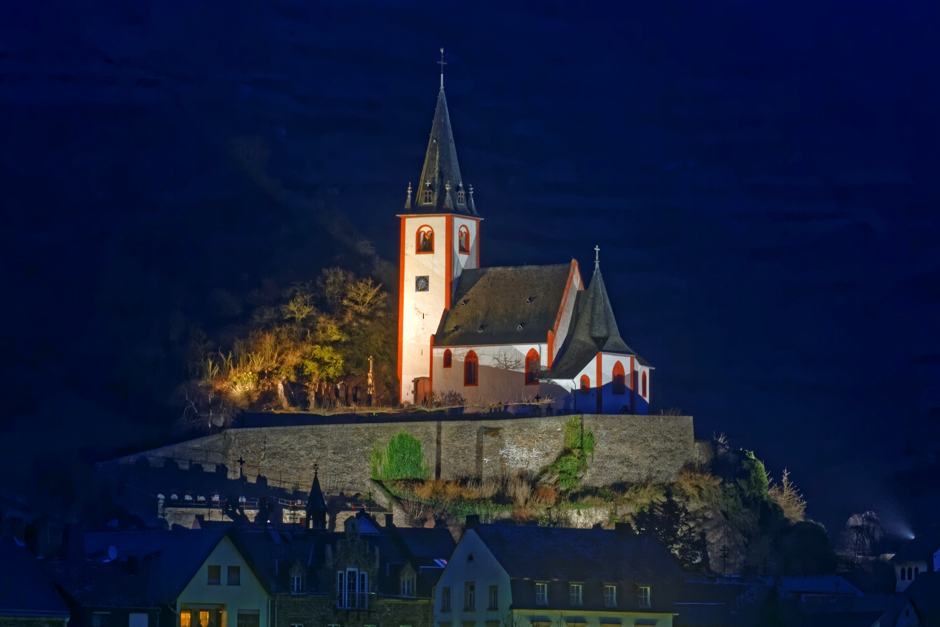 Church on a hill at night in Brodenbach, Germany HD Wallpaper