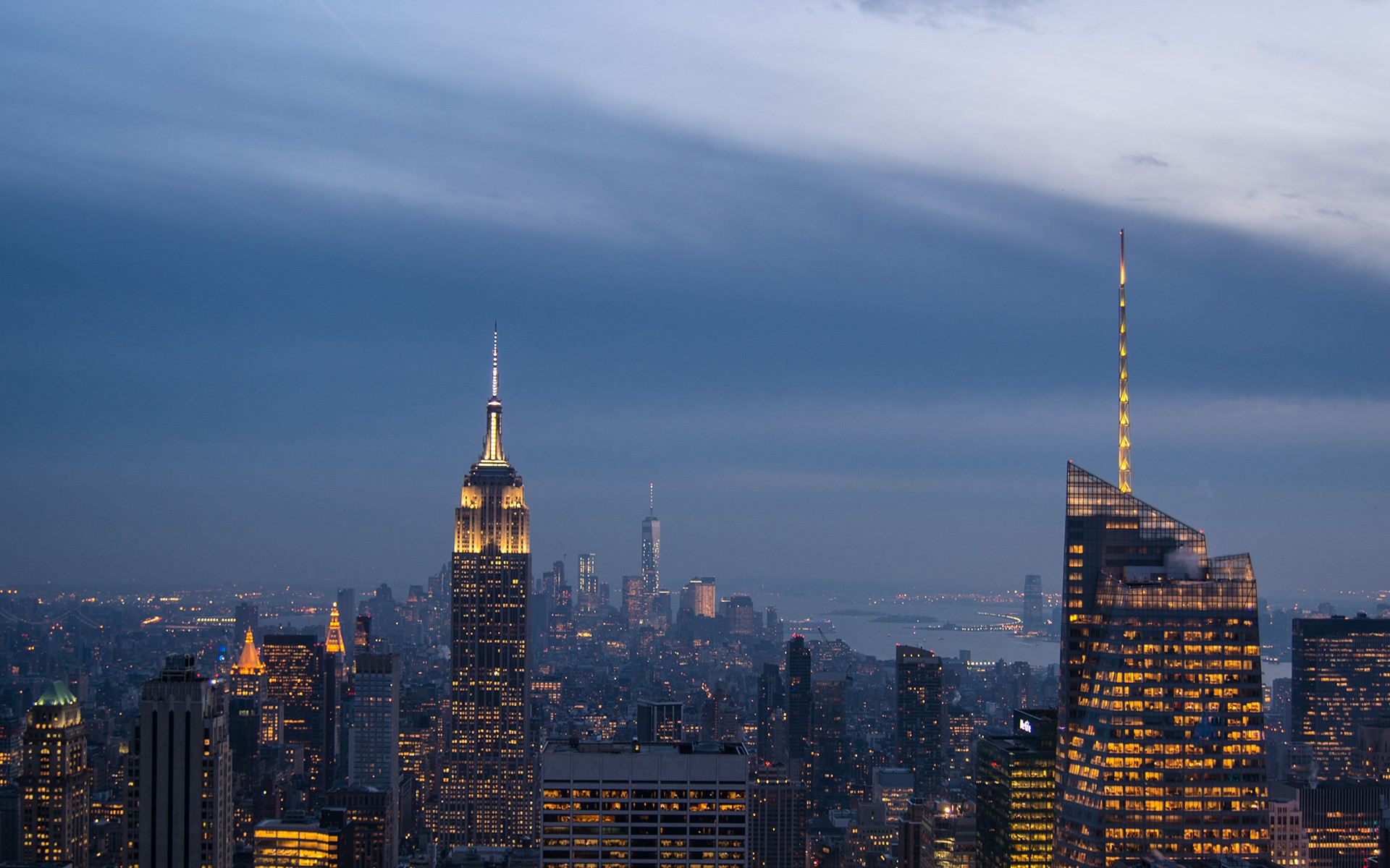 New York City skyline at dusk with Empire State Building HD Wallpaper