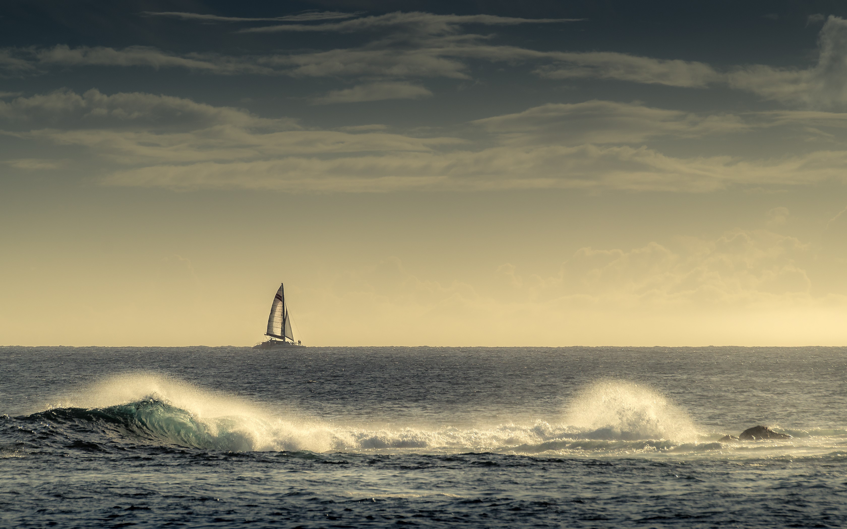 Sailboat on the ocean with waves HD Wallpaper