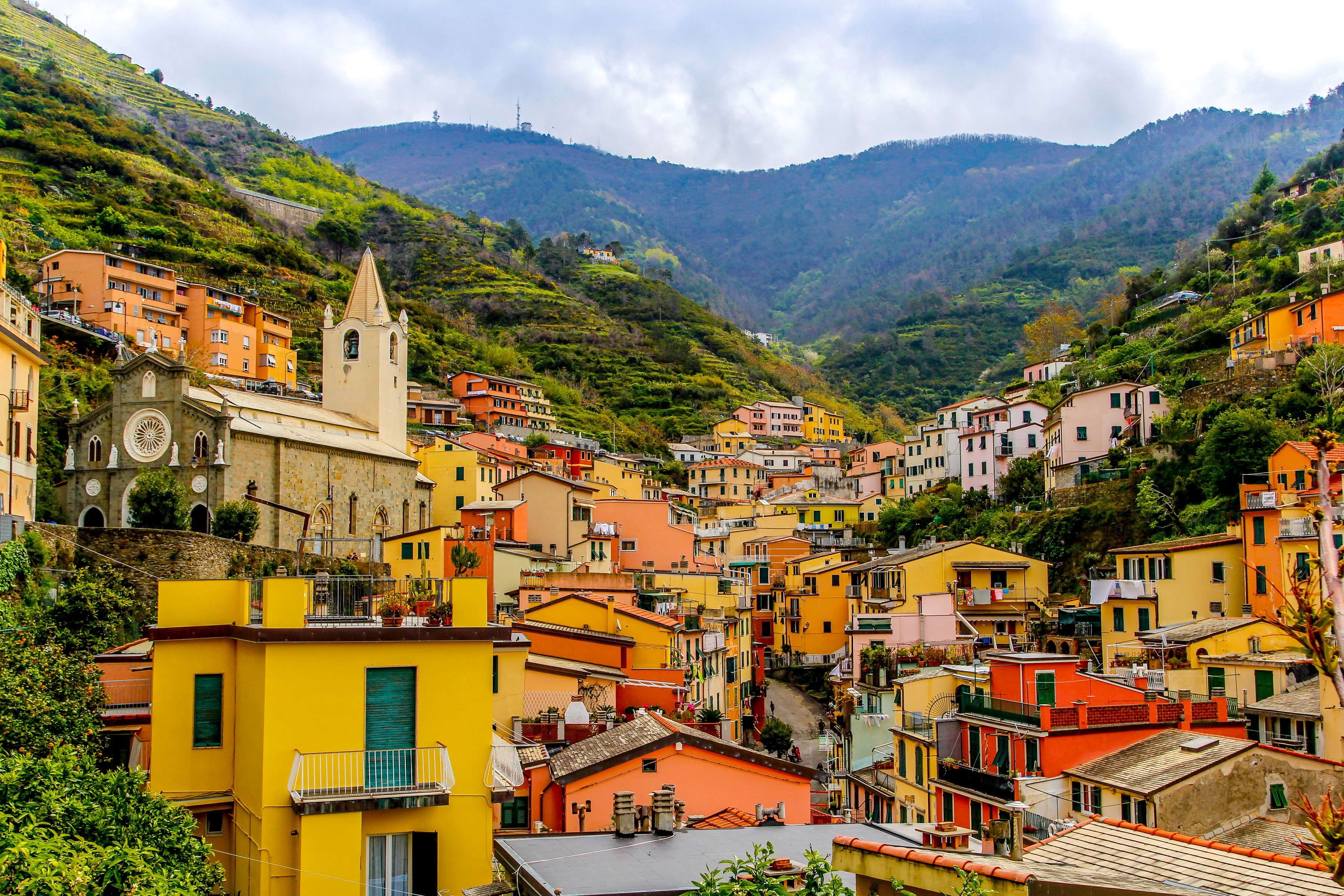 Colorful houses on a mountainside in Cinque Terre, Italy HD Wallpaper