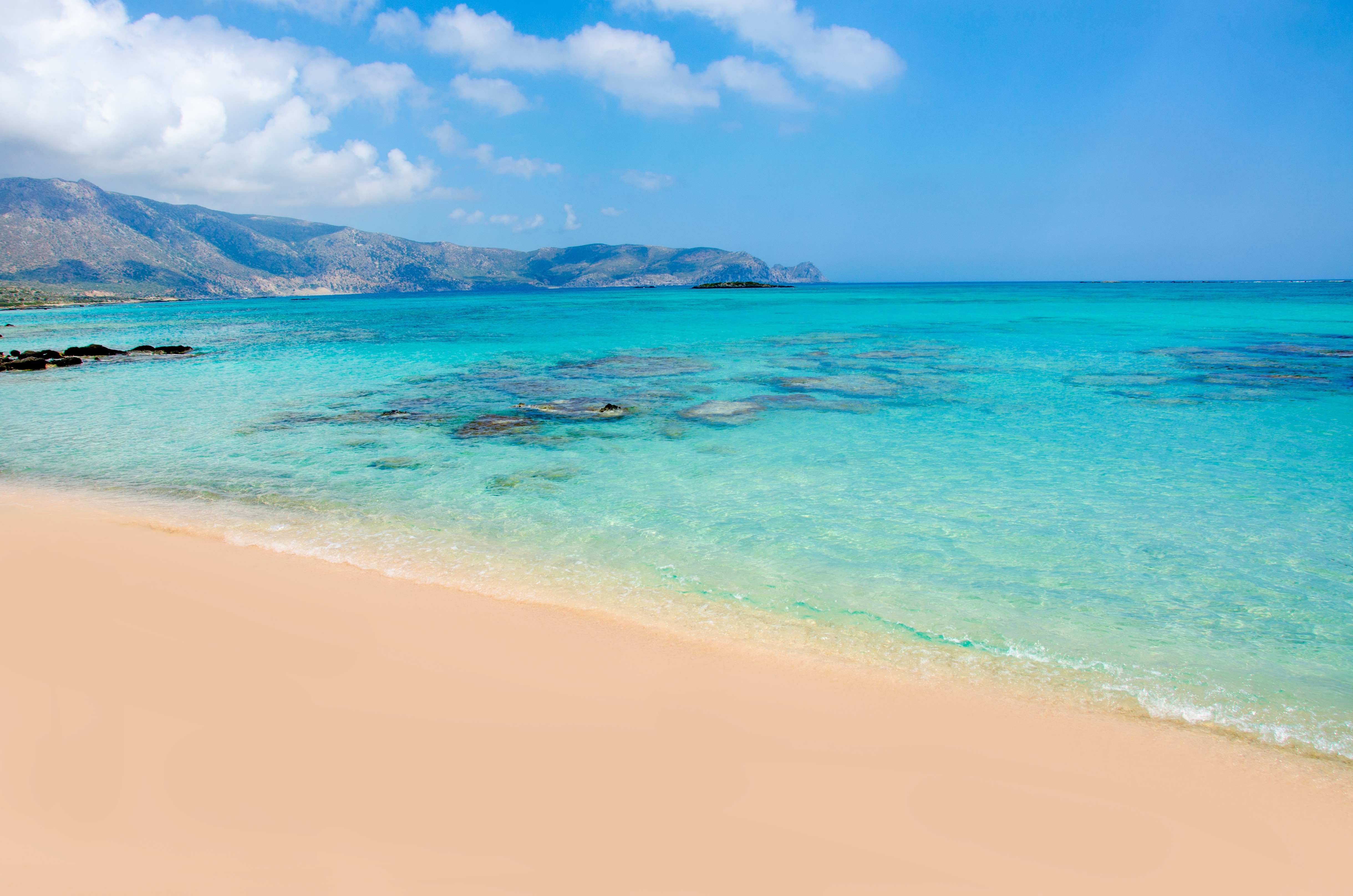 4K Beach with Turquoise Sea and Mountains HD Wallpaper