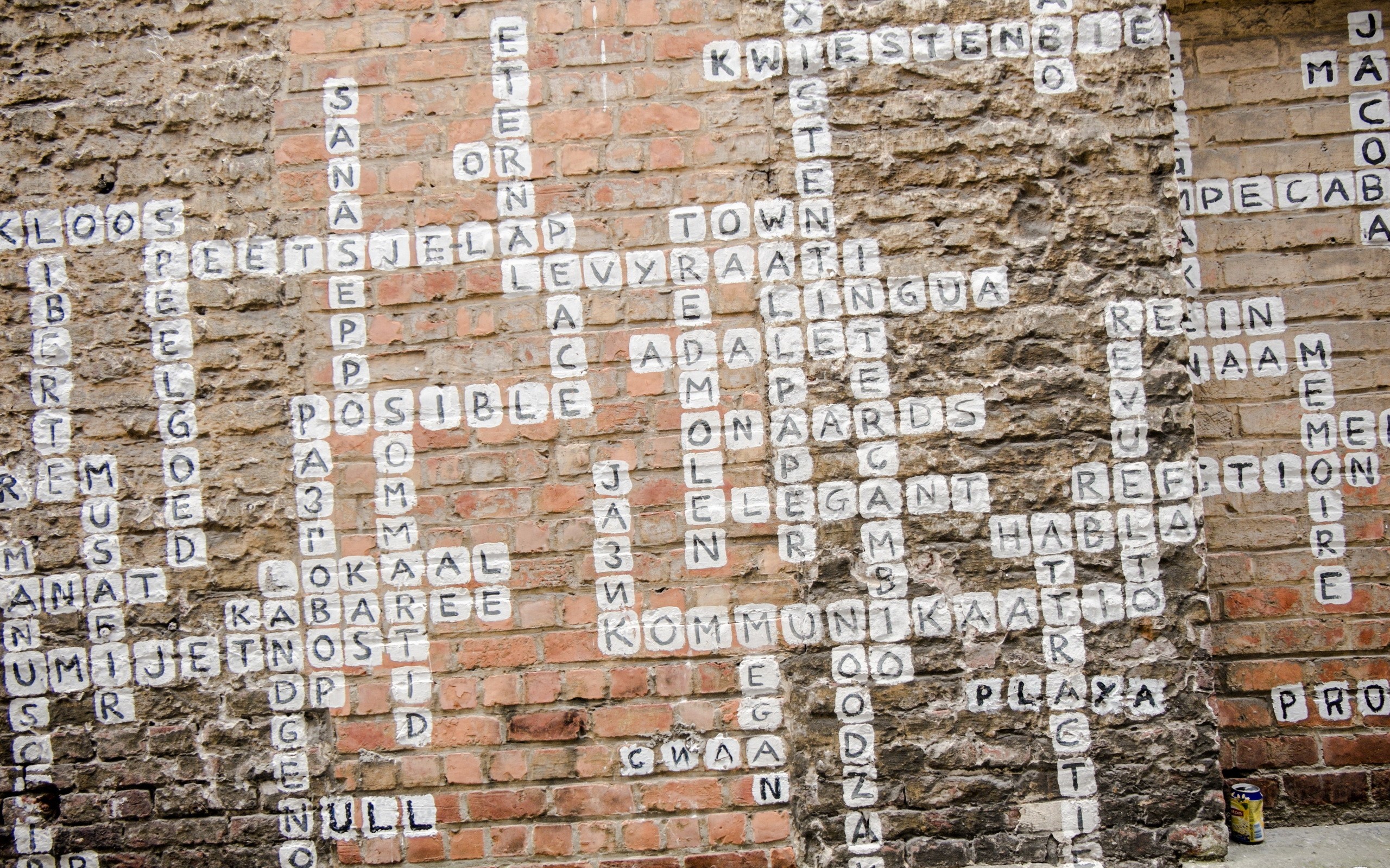Crossword puzzle painted on a brick wall HD Wallpaper