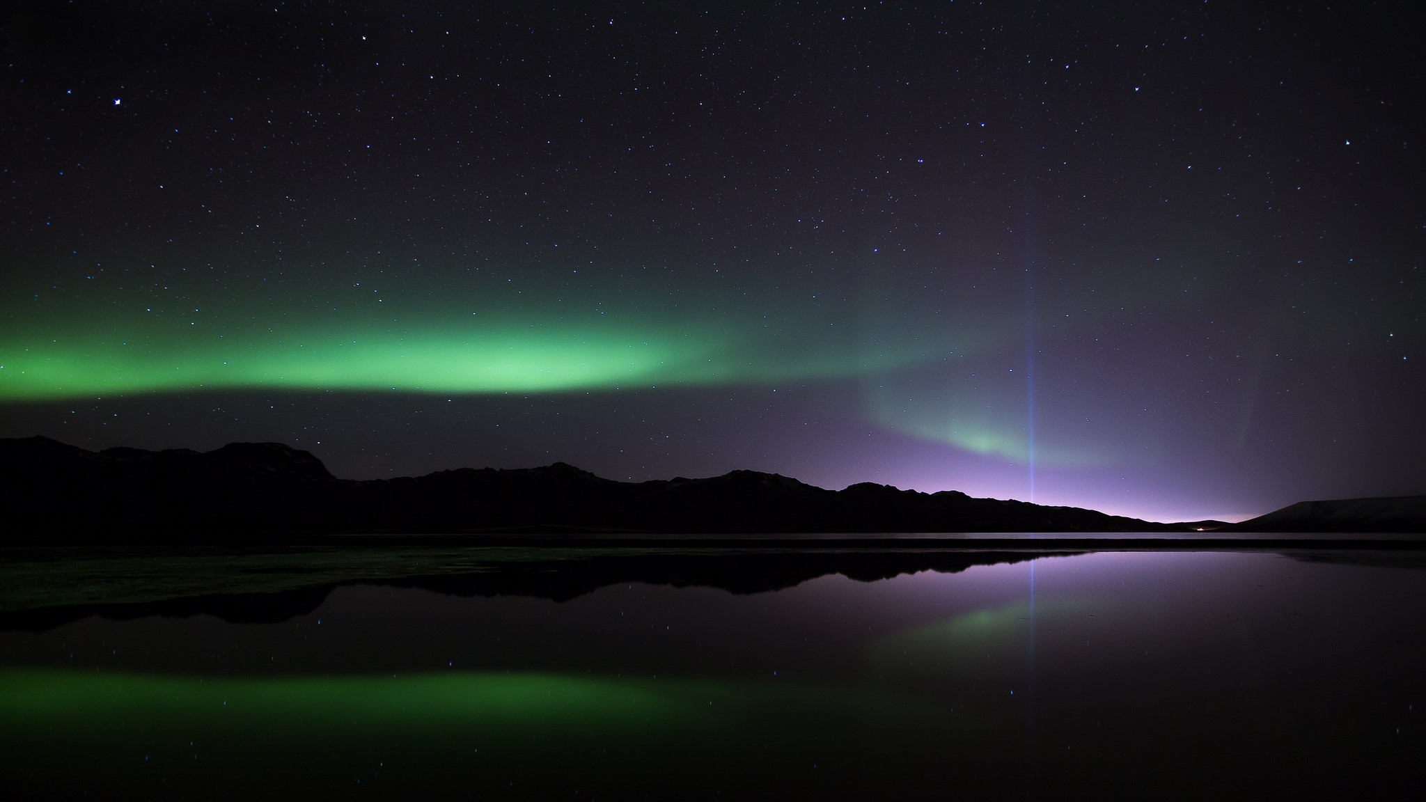 Aurora Borealis over mountains and lake at night HD Wallpaper