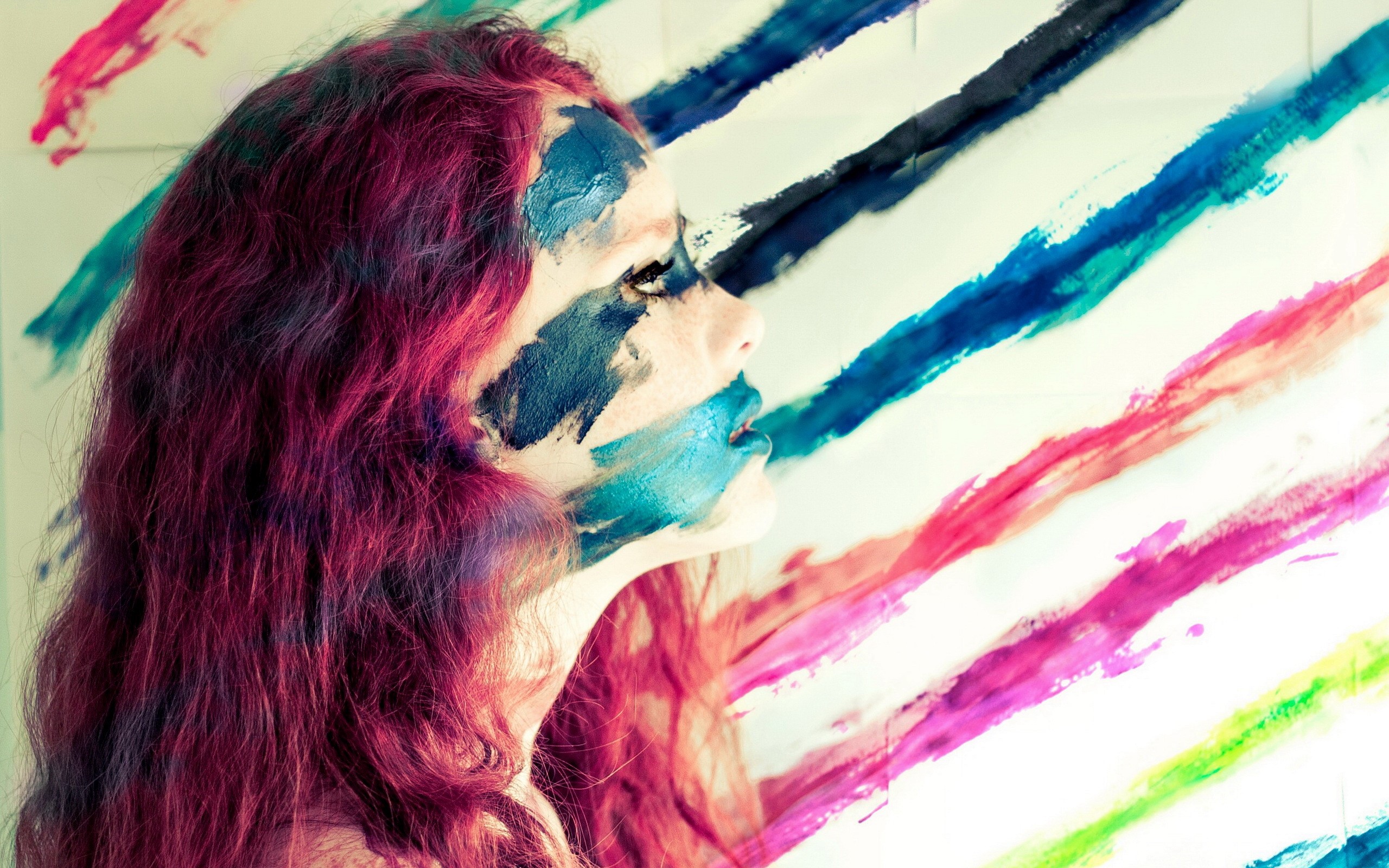 Woman with paint on her face and colorful stripes HD Wallpaper