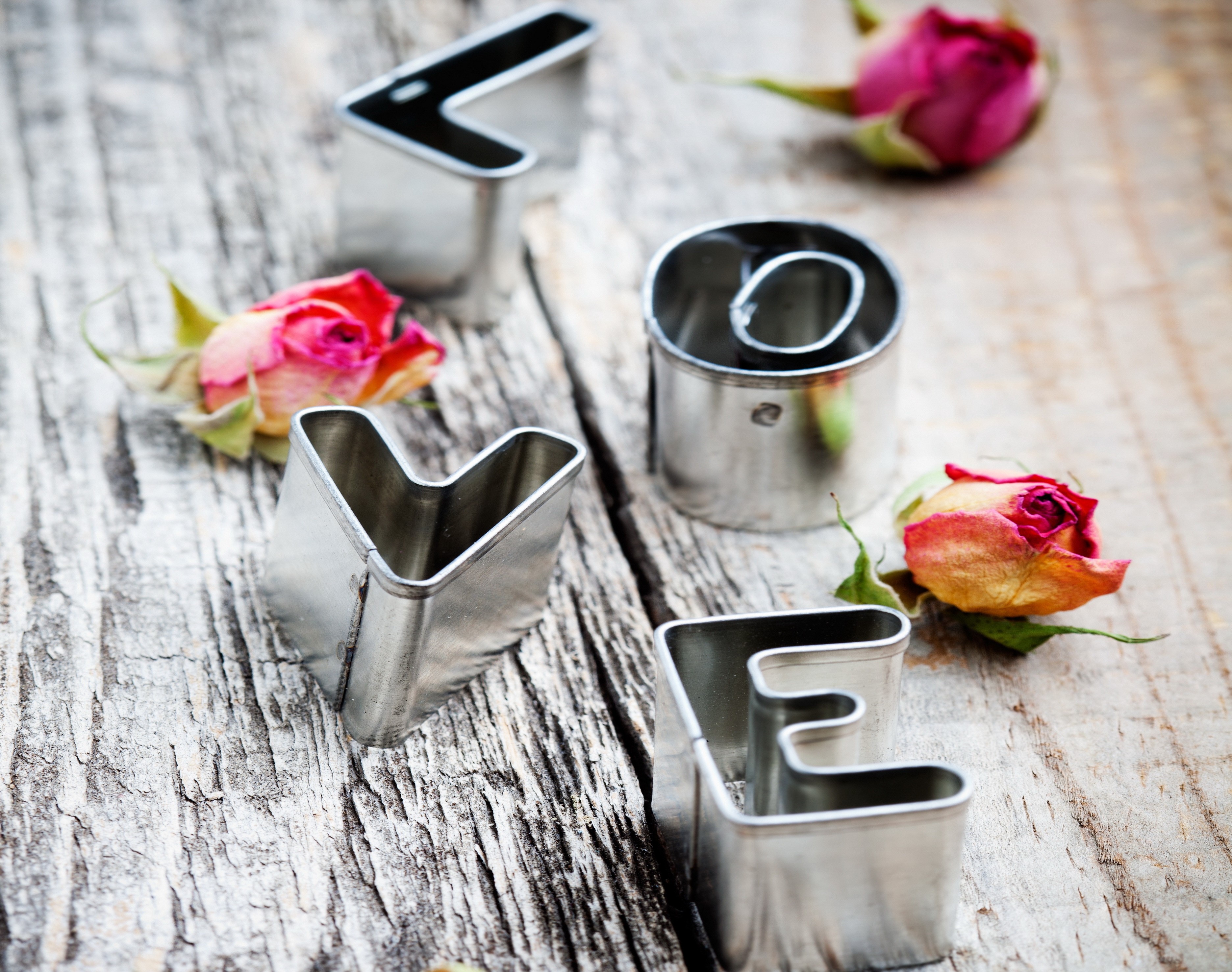 Love letter cookie cutters with dried roses HD Wallpaper
