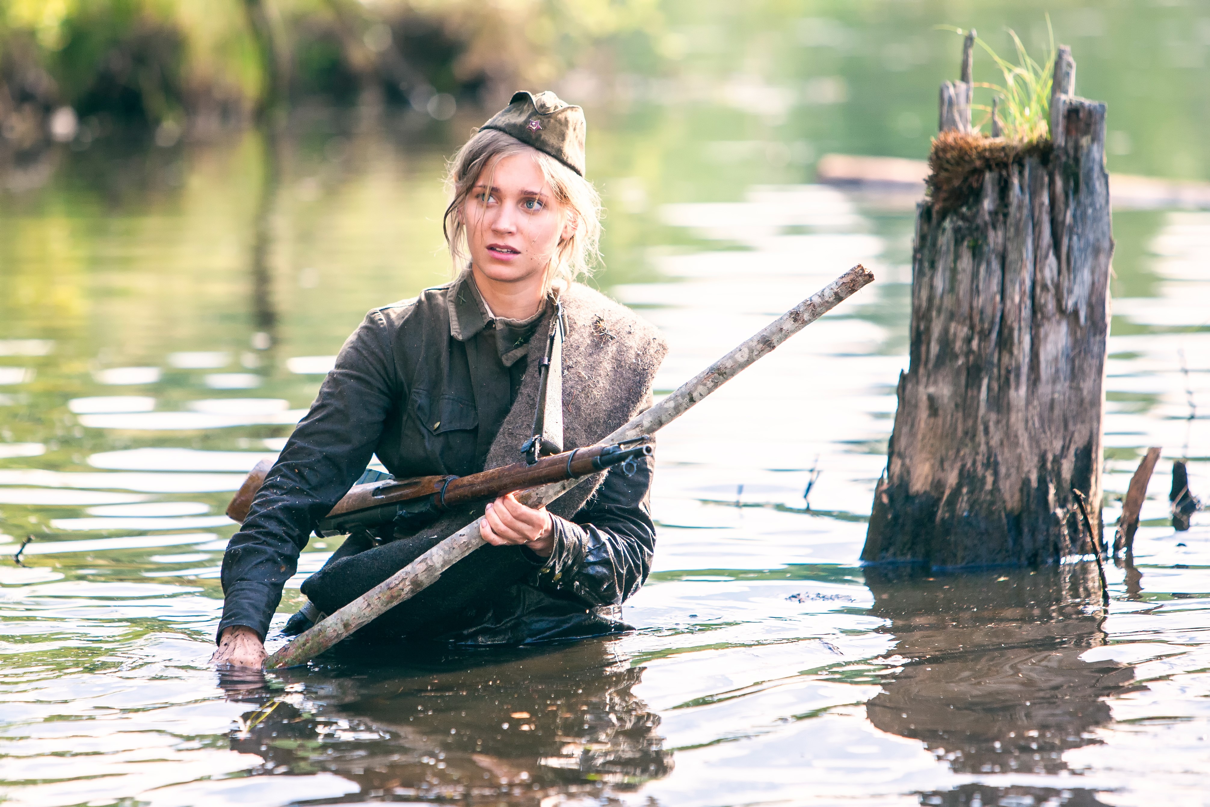 Soldier in water with rifle from The Dawns Here Are Quiet HD Wallpaper
