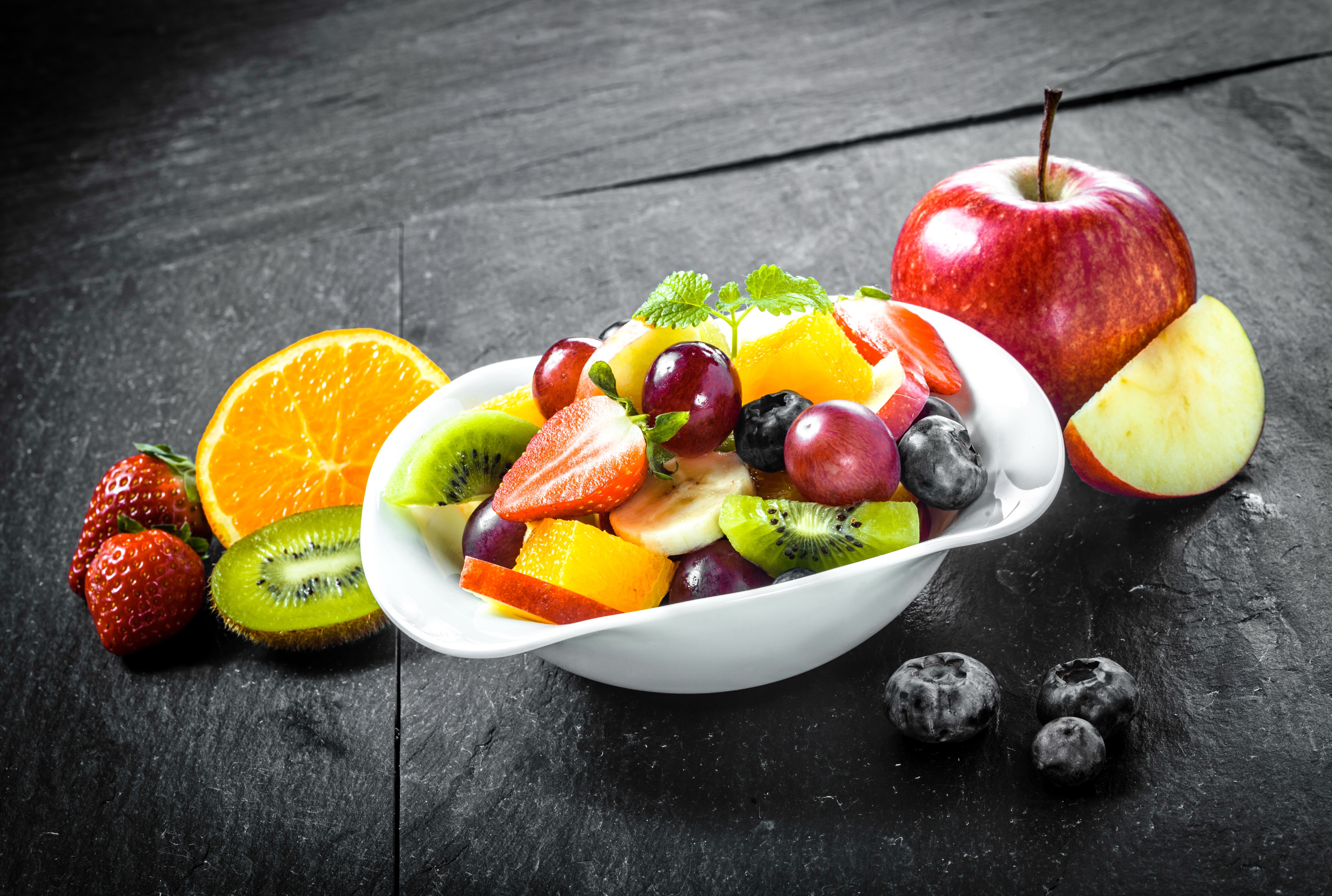 Fruit Salad with Apple, Orange, Strawberries, Kiwi, Blueberries, and Grapes HD Wallpaper