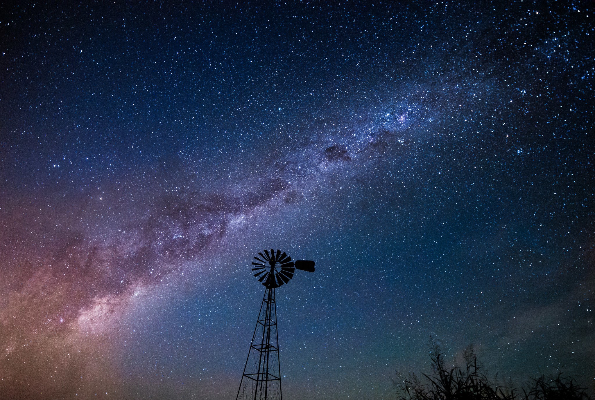 Milky Way over a windmill at night HD Wallpaper