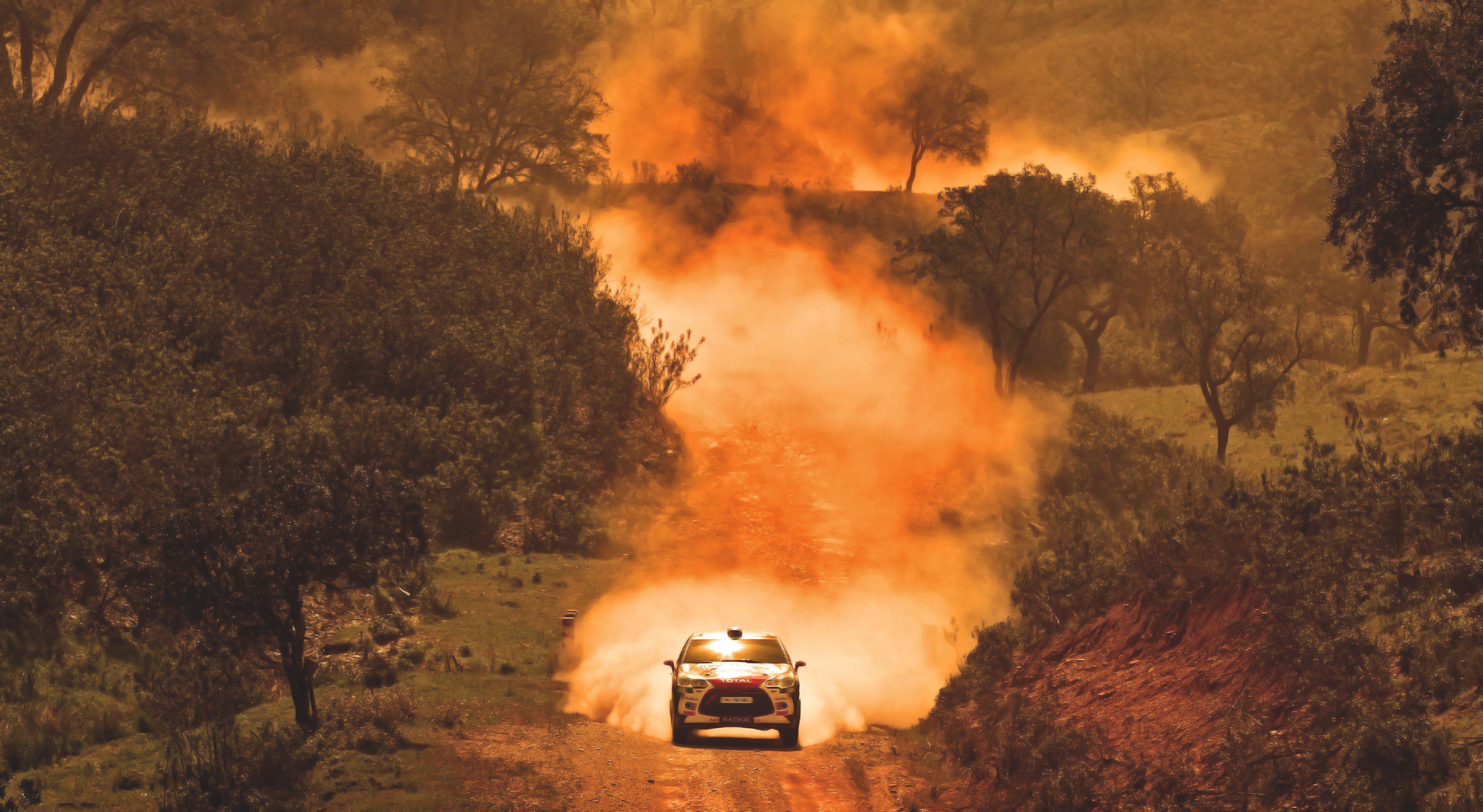 Citroen DS3 WRC car kicking up dust on a rally stage HD Wallpaper