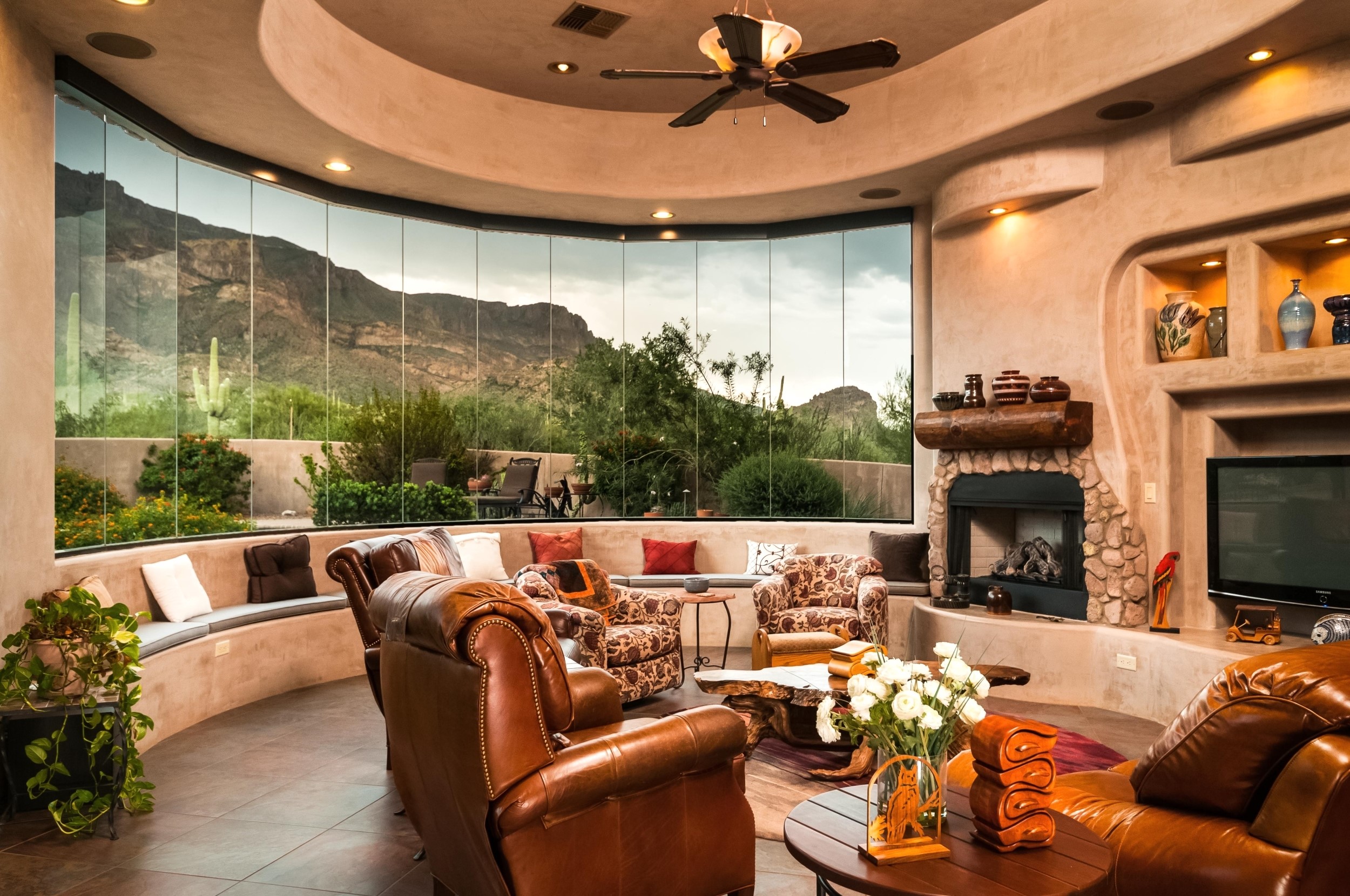 Living room with fireplace and mountain view HD Wallpaper