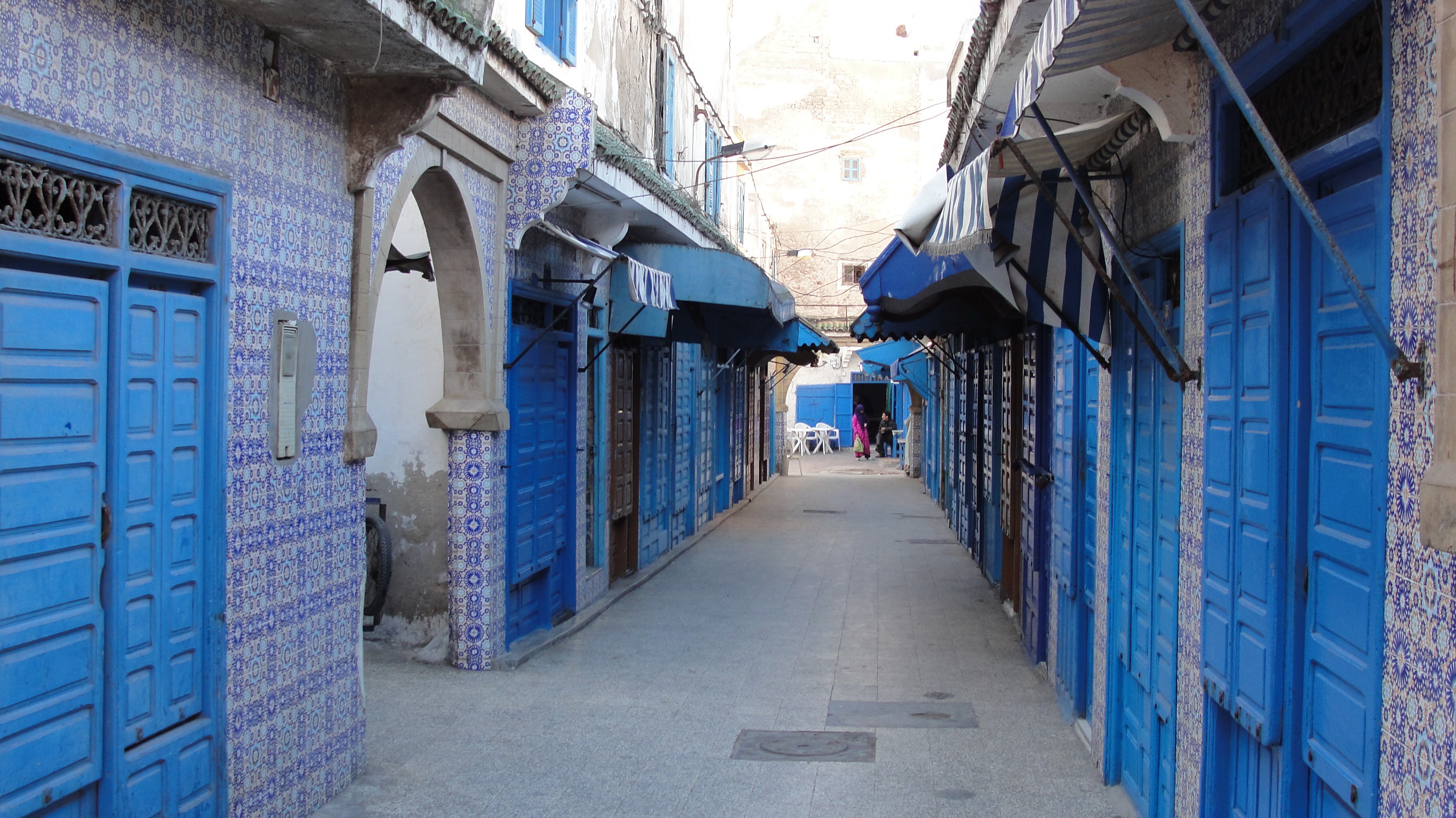 Essaouira street with blue doors and tiled walls, Morocco HD Wallpaper