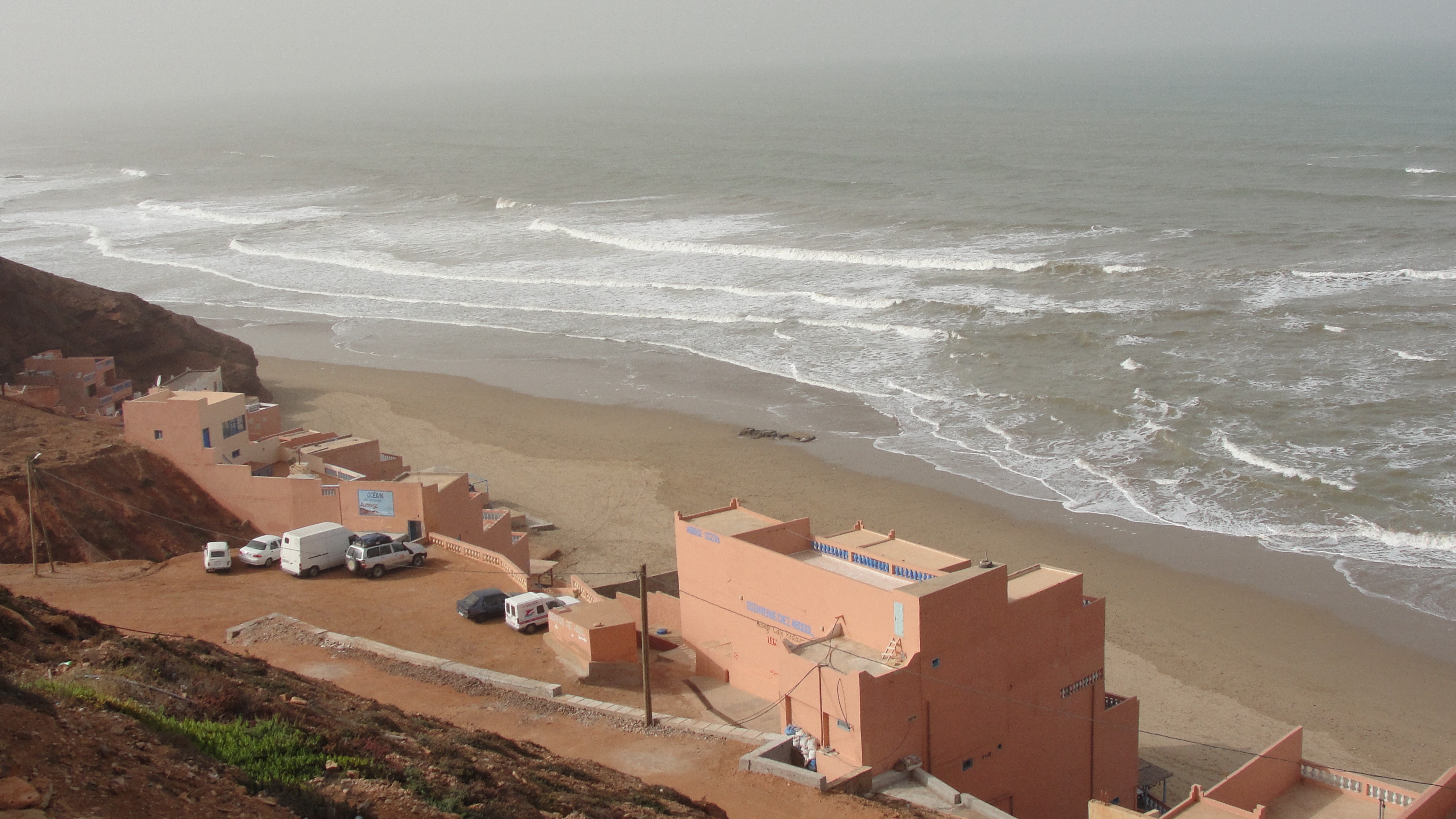 Coastal village with houses and the sea in Morocco HD Wallpaper