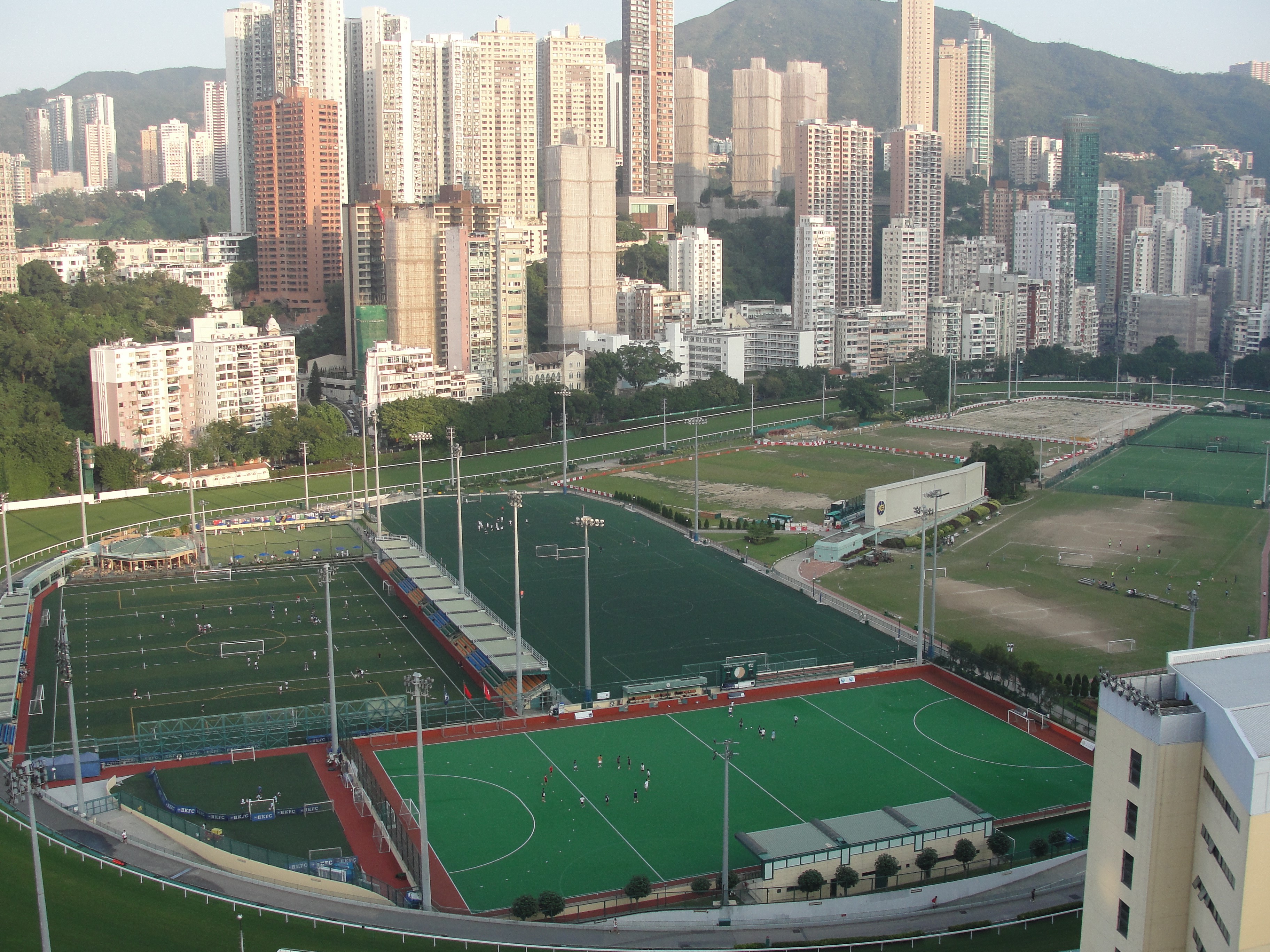 Sports fields and skyscrapers in Hong Kong HD Wallpaper