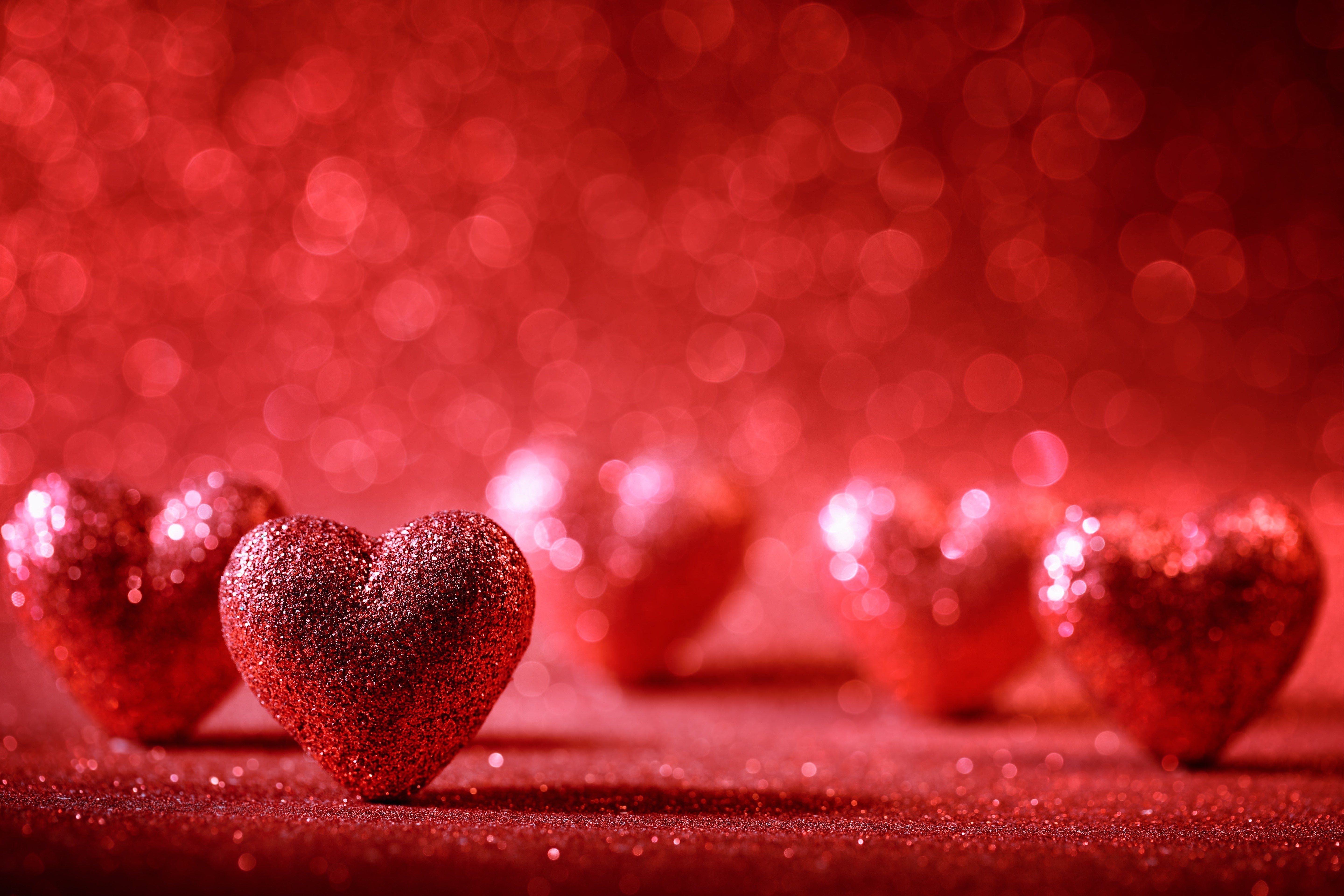 Red Glitter Hearts on Red Bokeh Background HD Wallpaper