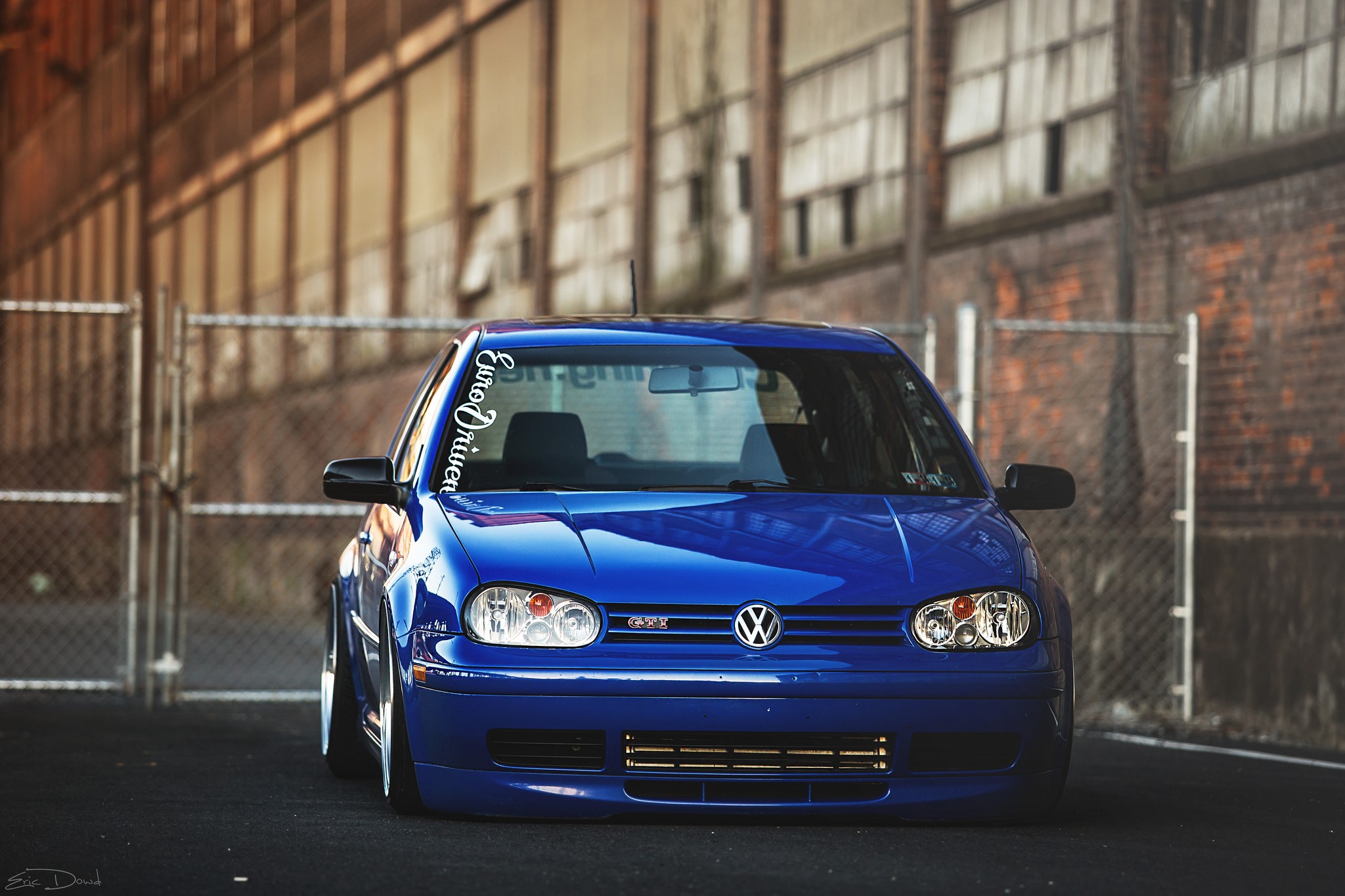 Blue Volkswagen Golf GTI parked outdoors HD Wallpaper