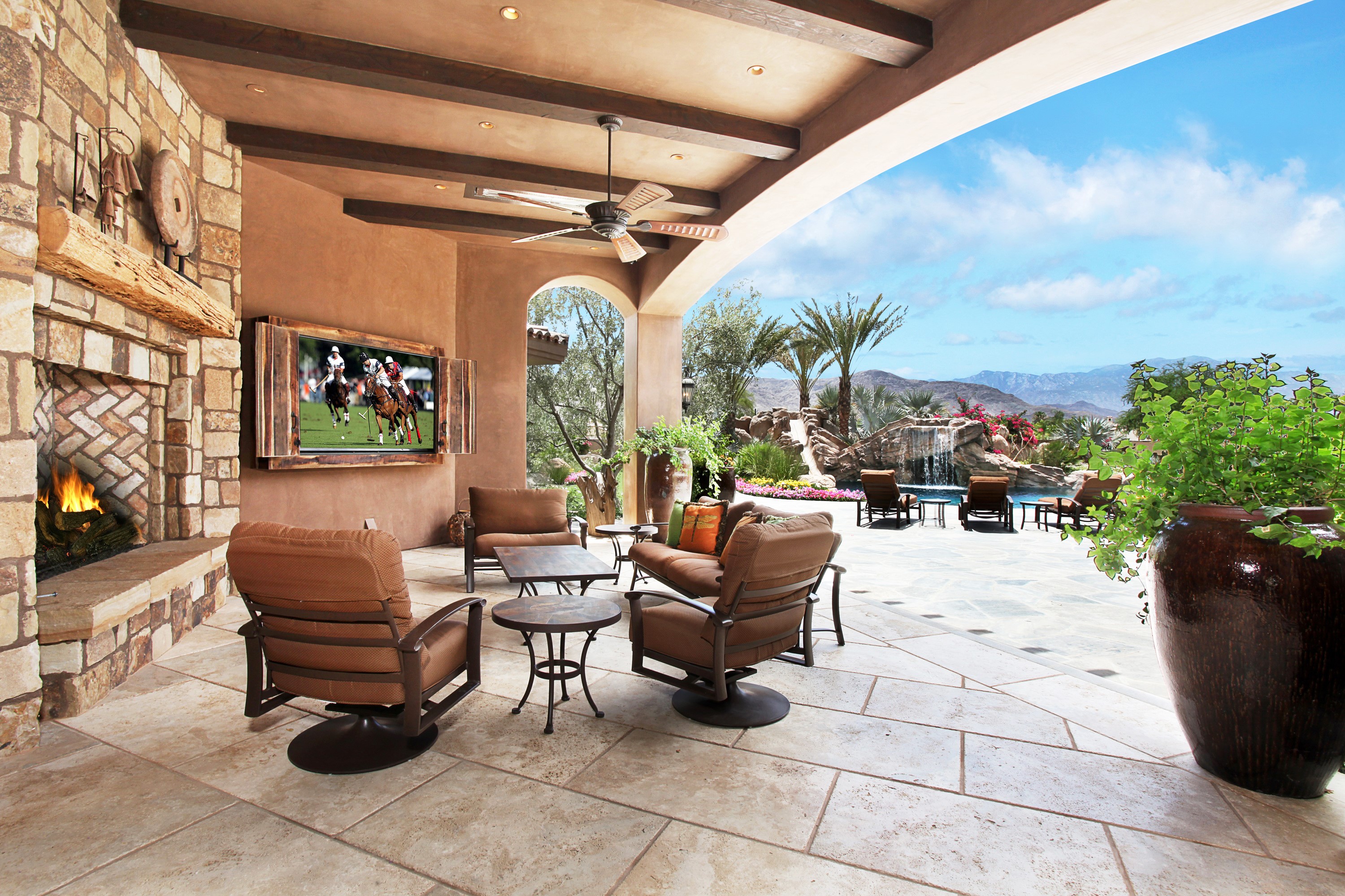 Outdoor patio with fireplace and pool HD Wallpaper