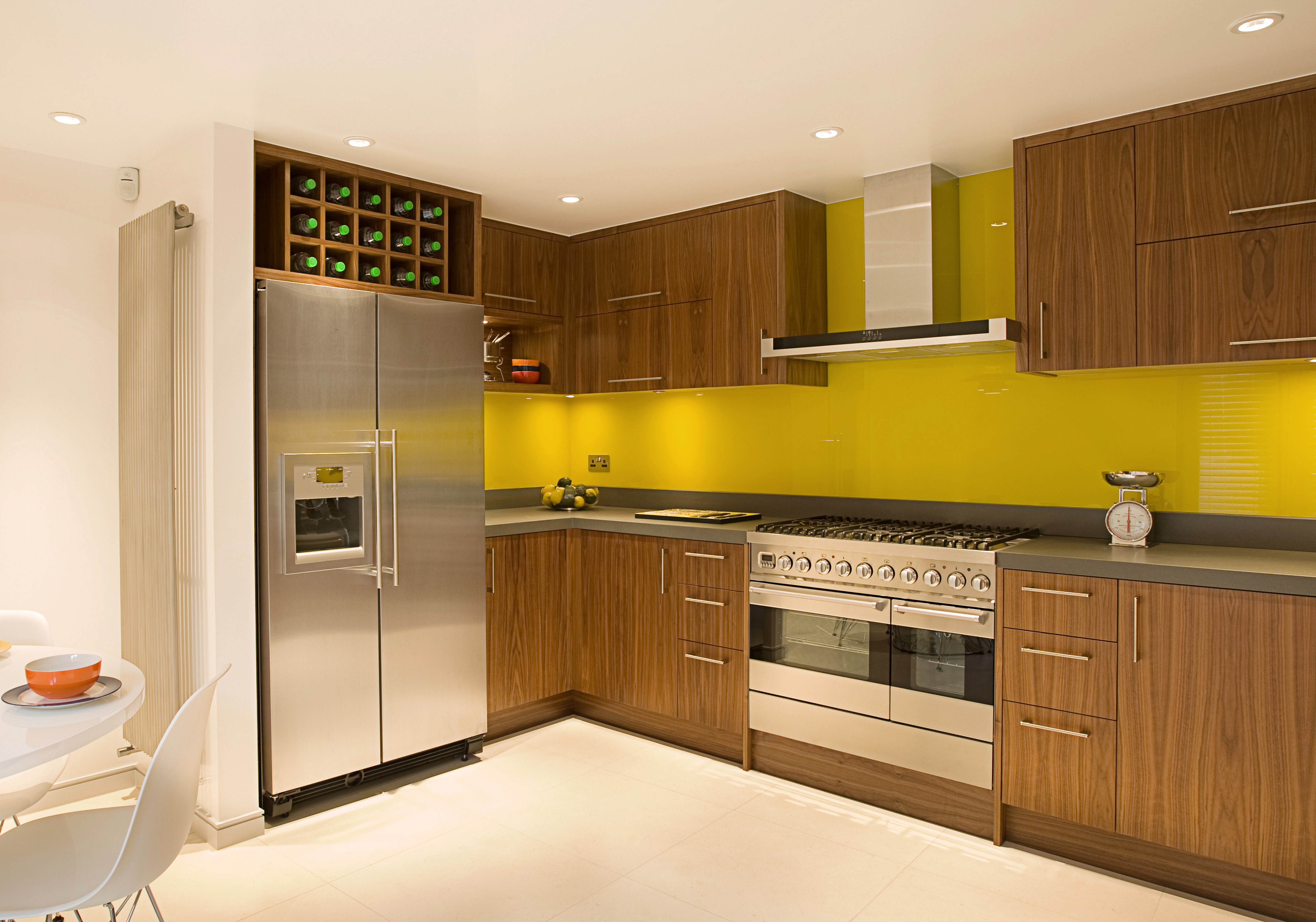 Modern Kitchen with Walnut Cabinets and Yellow Backsplash HD Wallpaper