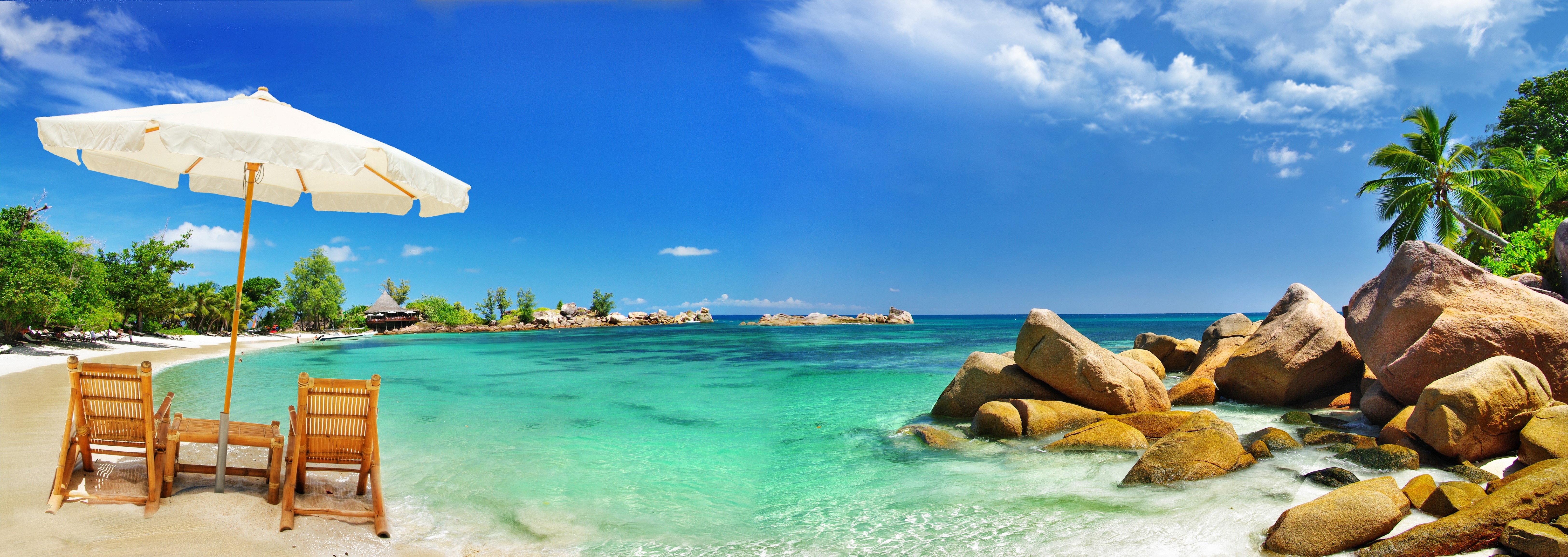 Tropical beach with chairs and umbrella HD Wallpaper