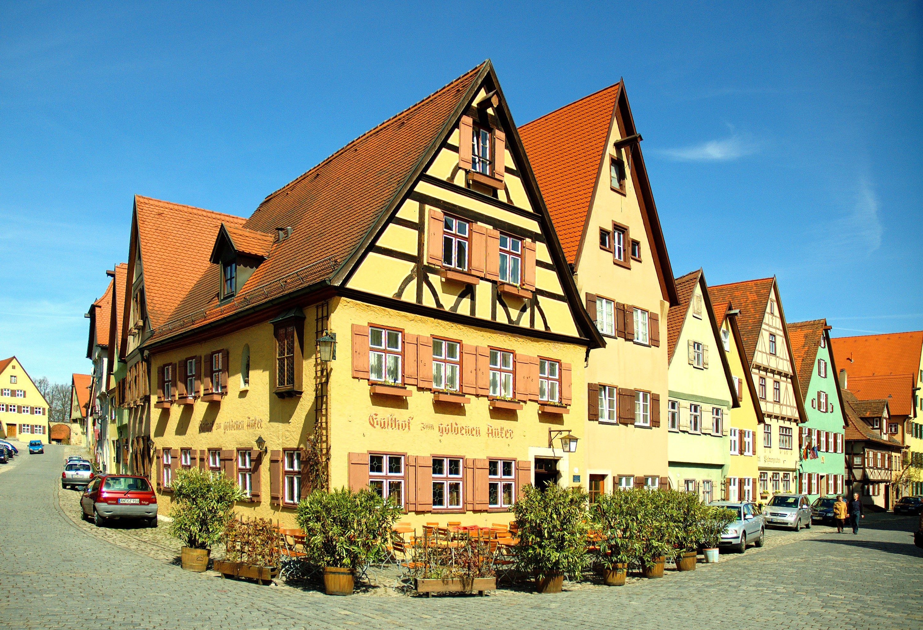 Half-timbered houses on a cobblestone street in Germany HD Wallpaper