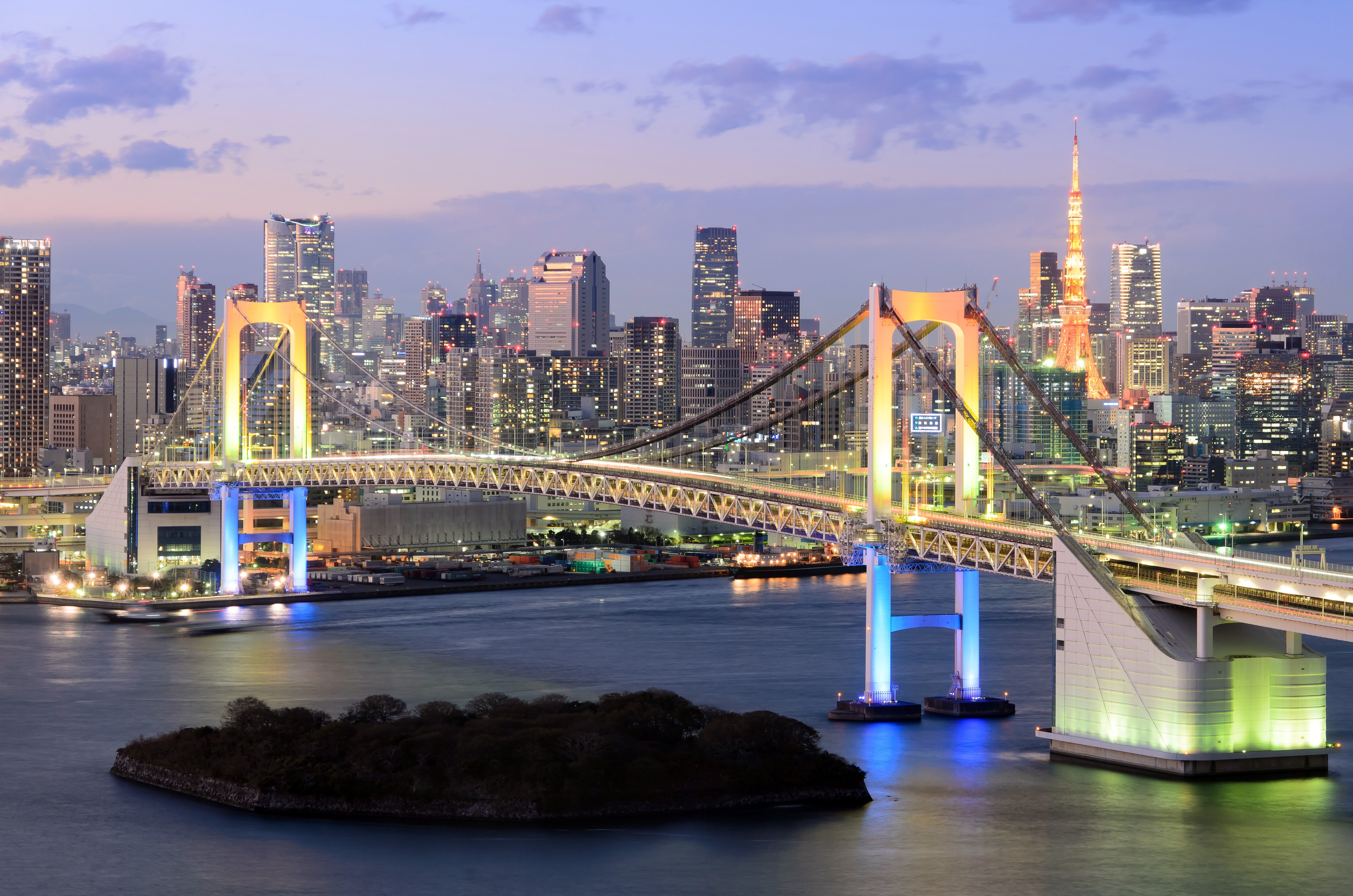 Rainbow Bridge and Tokyo skyline at dusk HD Wallpaper
