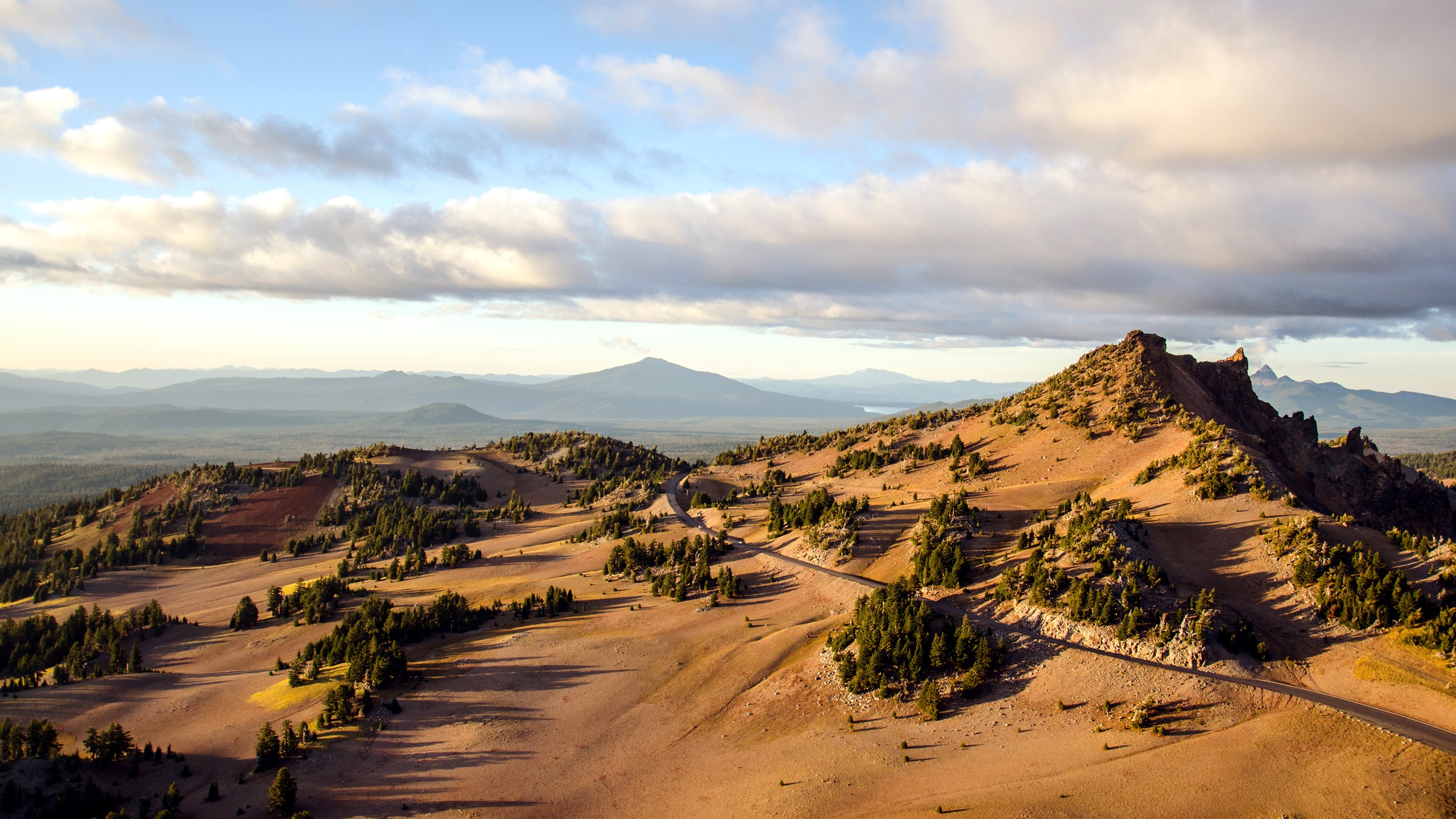 Mountain landscape with road and clouds HD Wallpaper