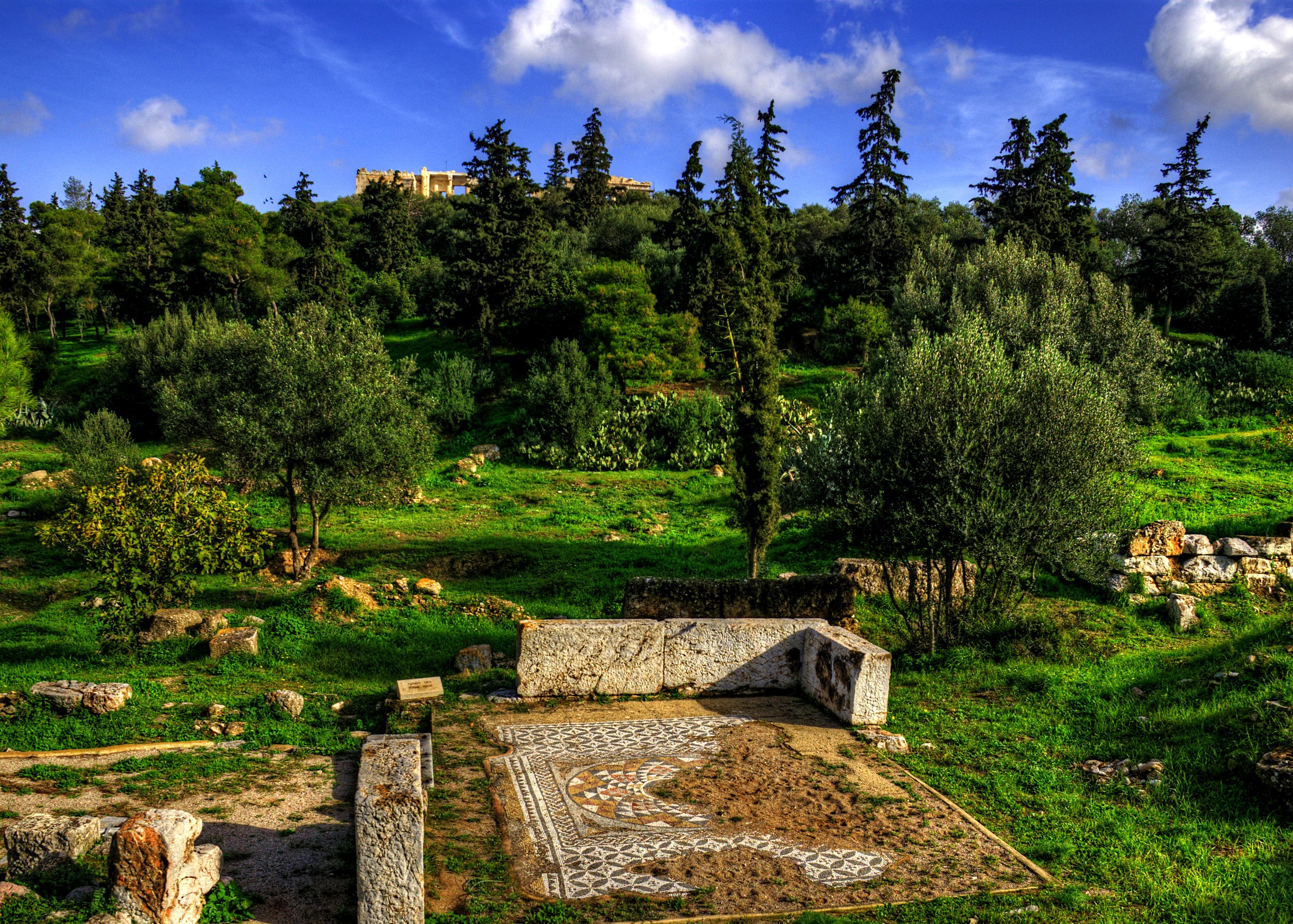 Ancient ruins with mosaic floor and trees on a hill HD Wallpaper