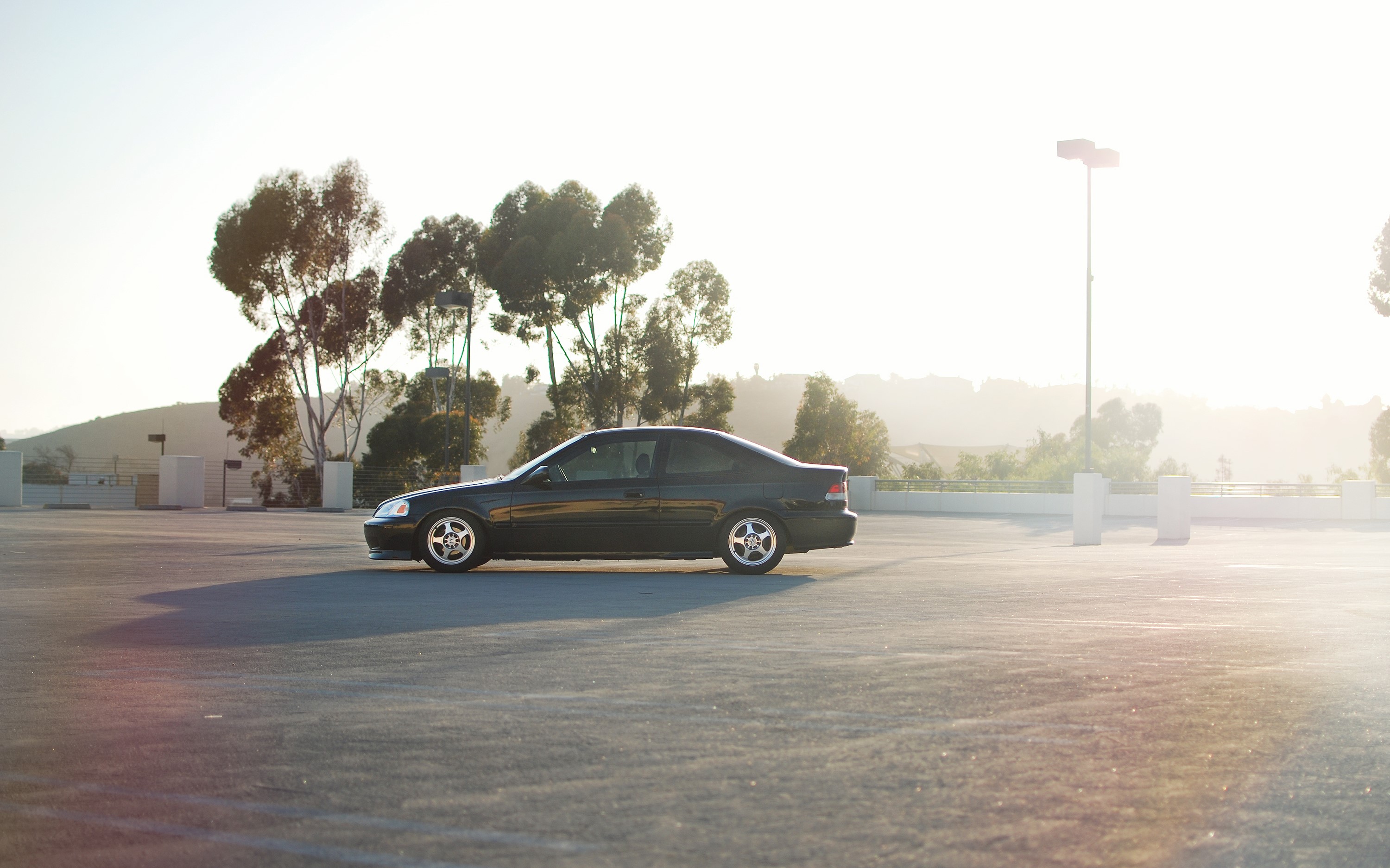 Black Honda Civic parked in a parking lot HD Wallpaper