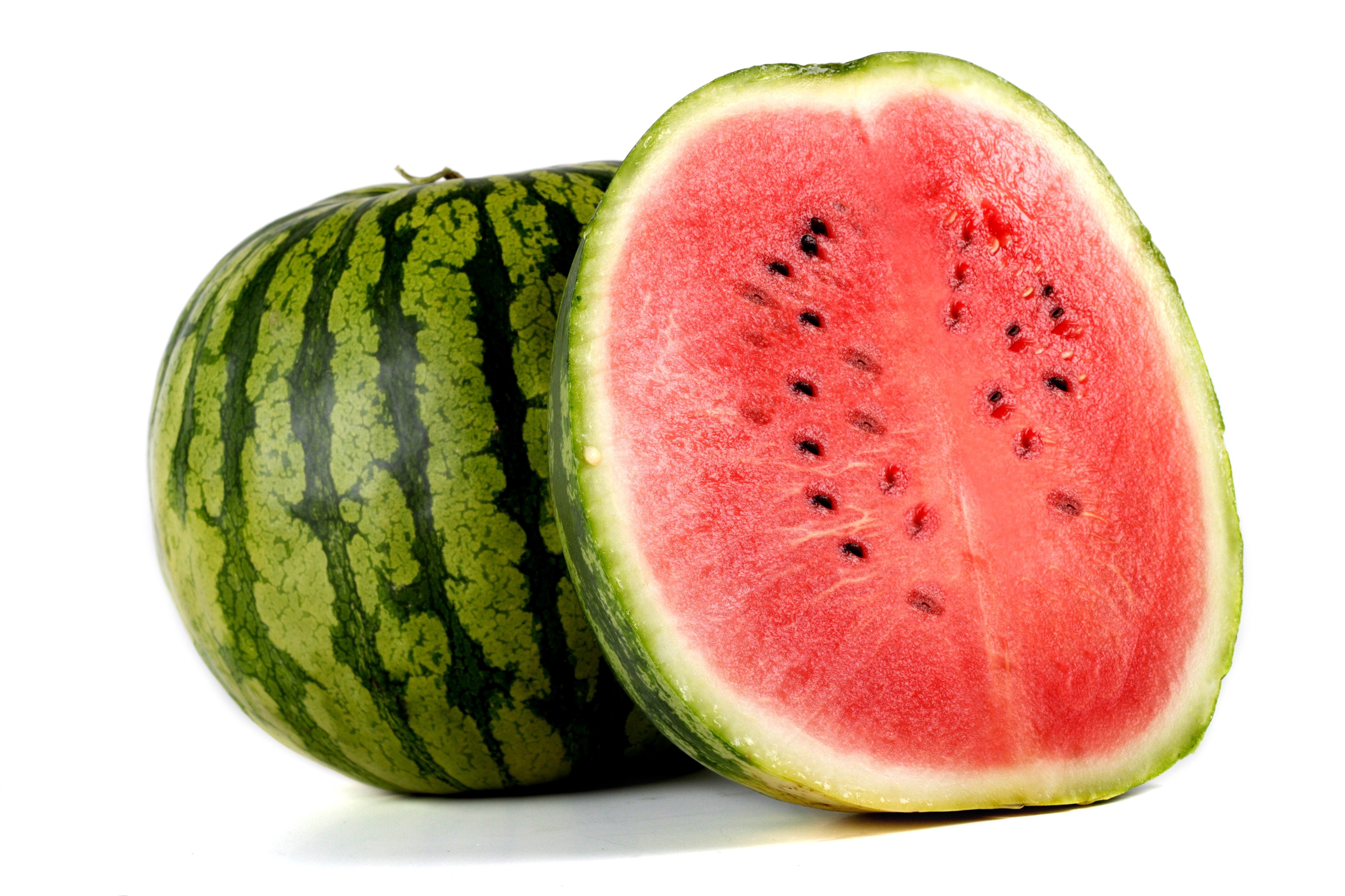 Whole and halved watermelon HD Wallpaper