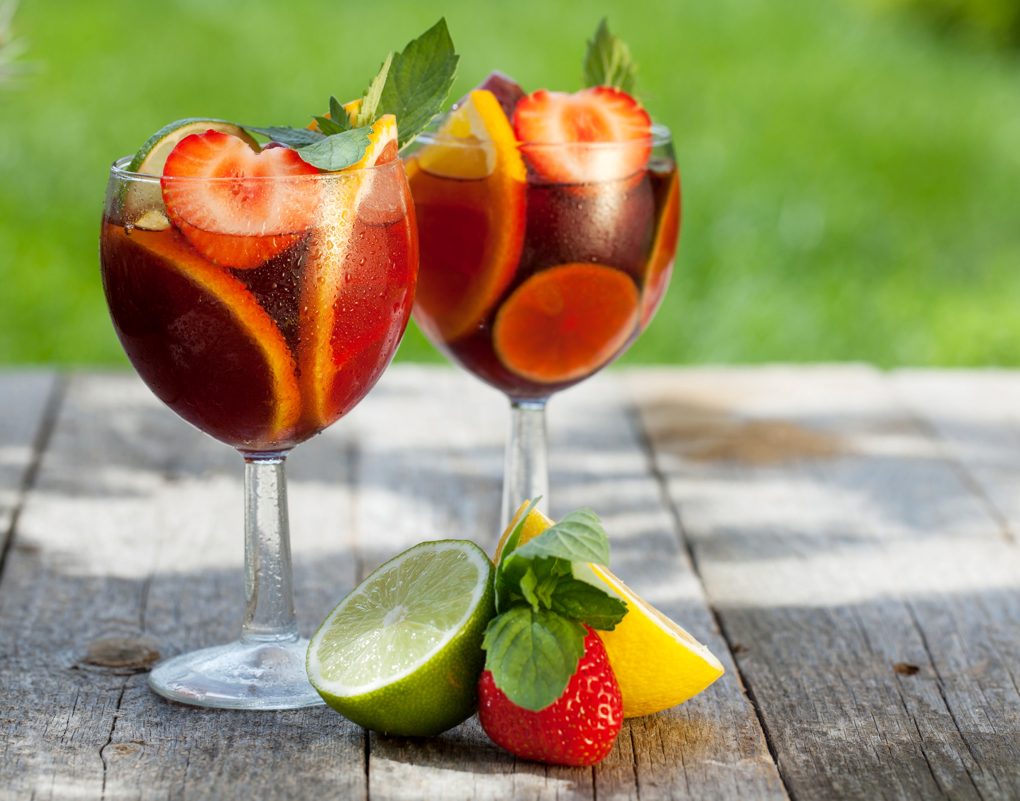 Two glasses of sangria with fruit and mint HD Wallpaper