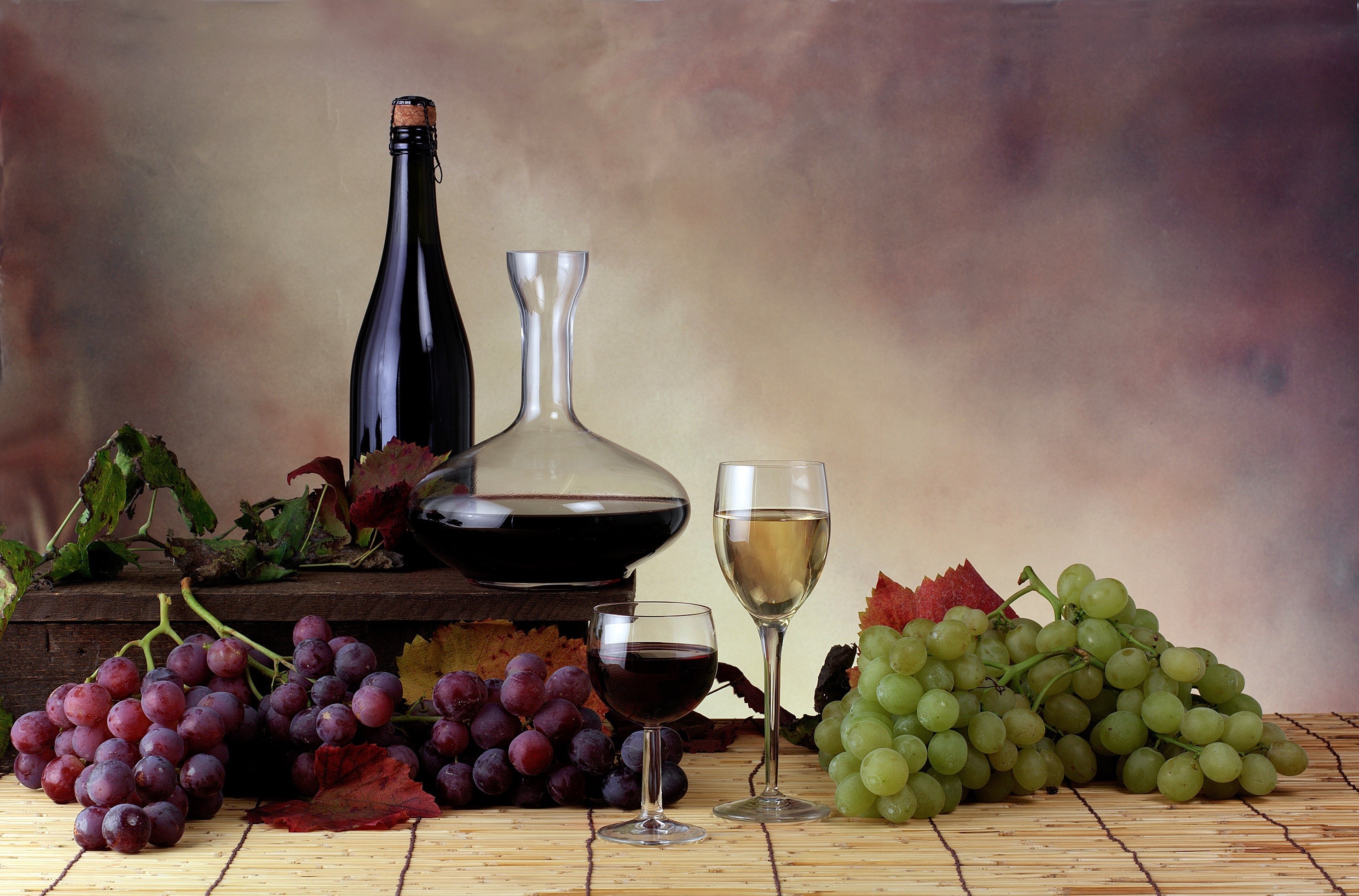 Wine bottle, decanter, and grapes with stemware HD Wallpaper