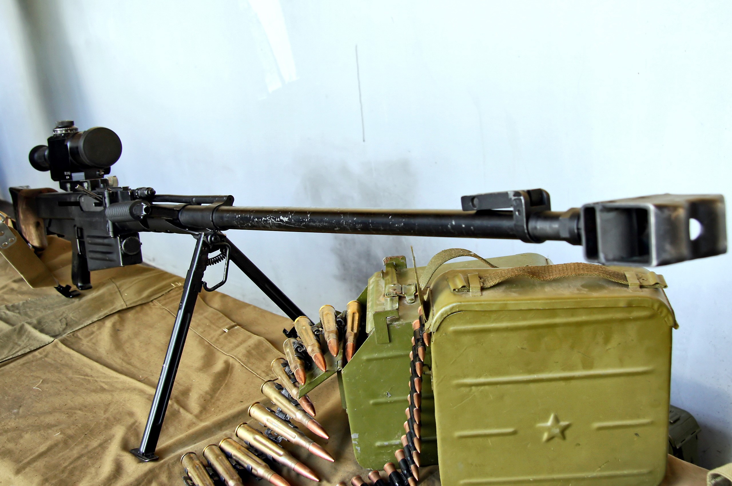 OSV-96 sniper rifle with ammunition and ammo boxes HD Wallpaper