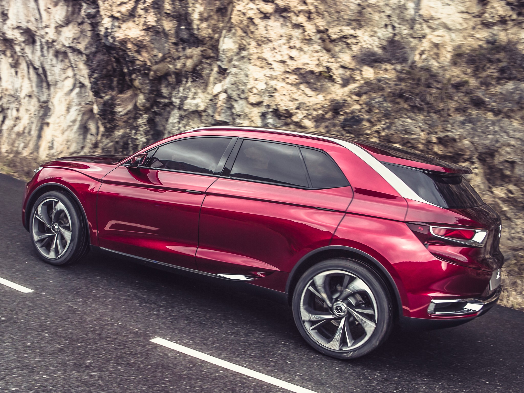 DS Wild Rubis Concept car driving on a road HD Wallpaper