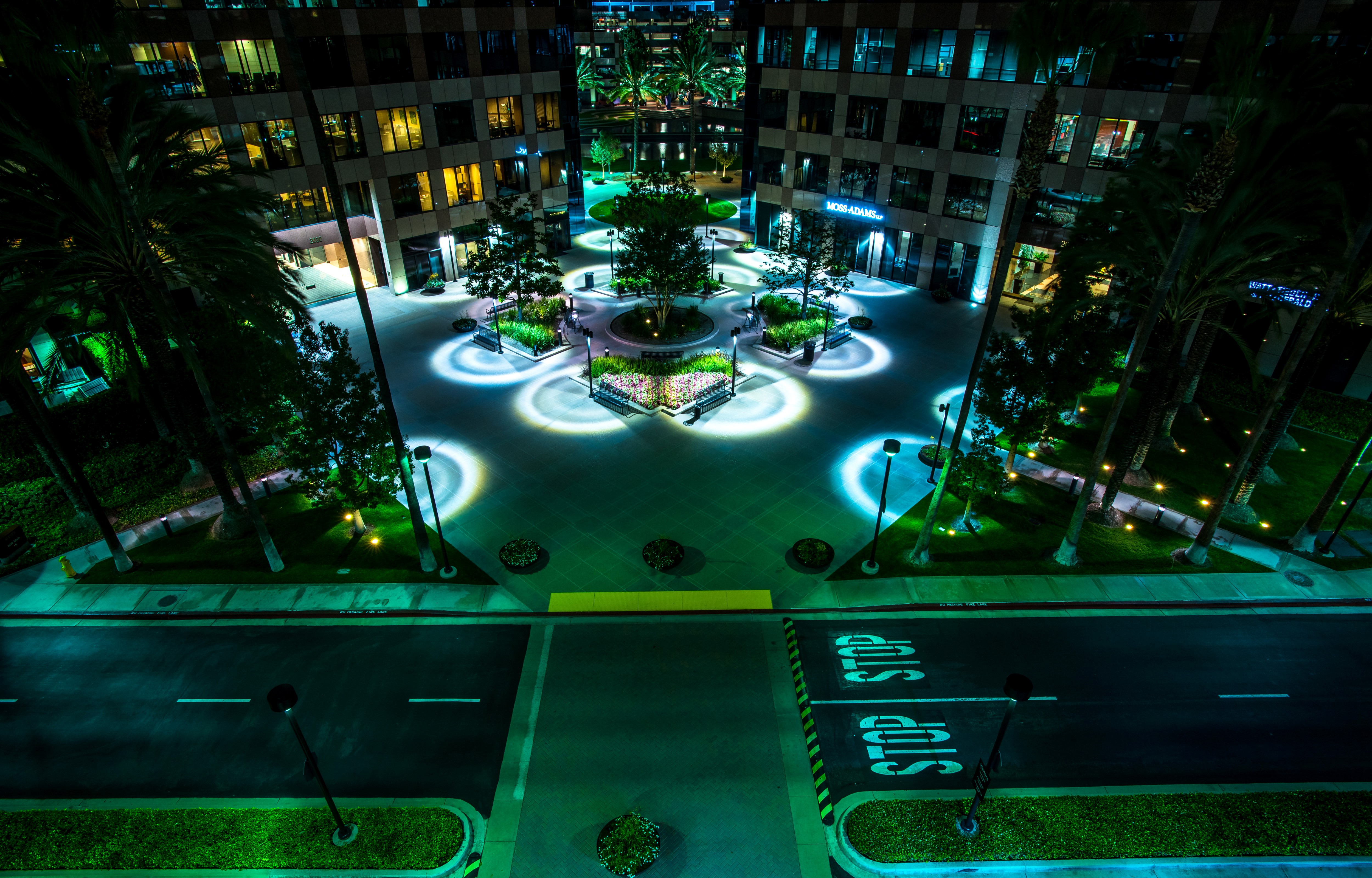Modern Courtyard at Night with Street Lights HD Wallpaper