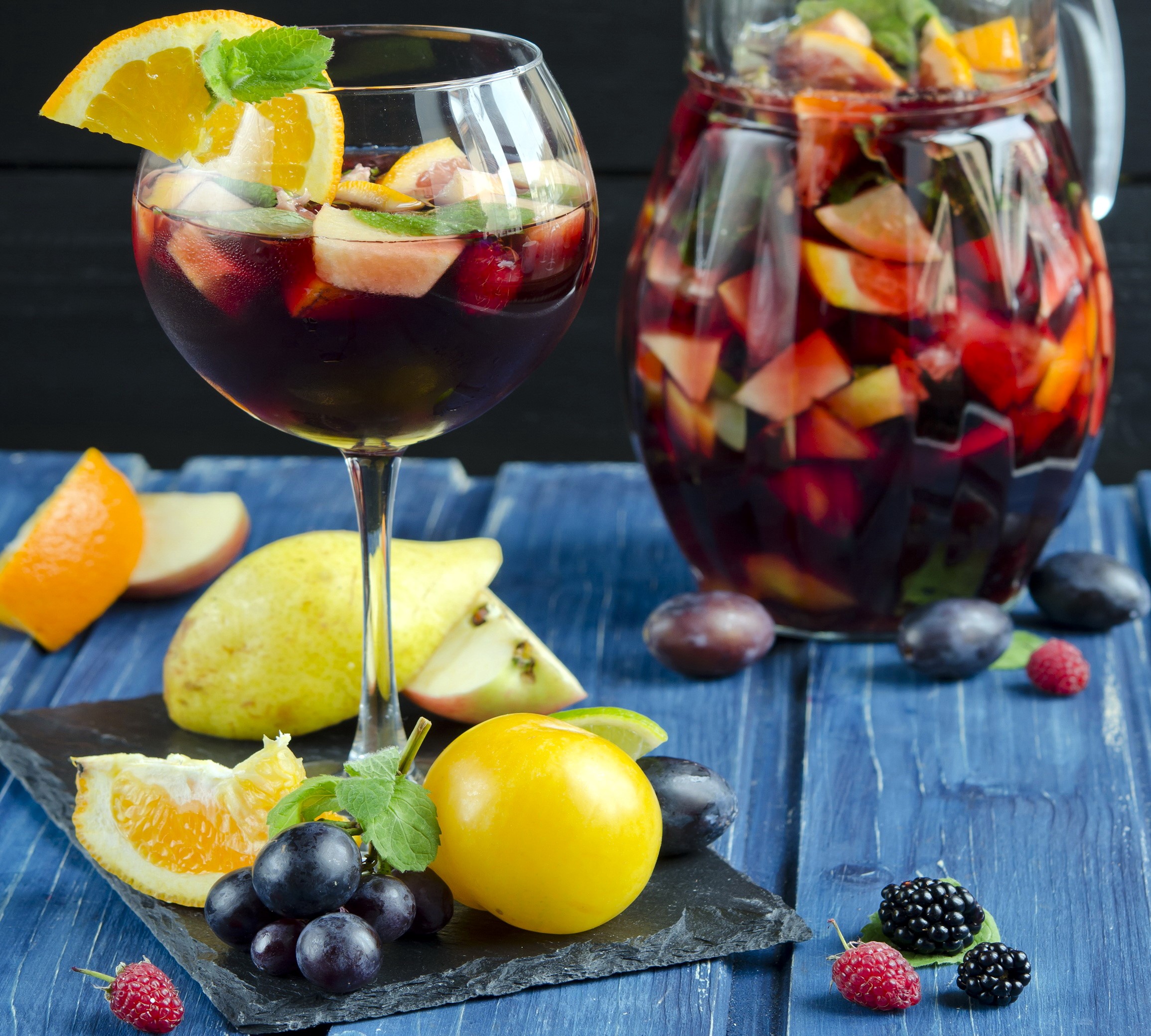 Sangria in a glass and pitcher with fruits HD Wallpaper