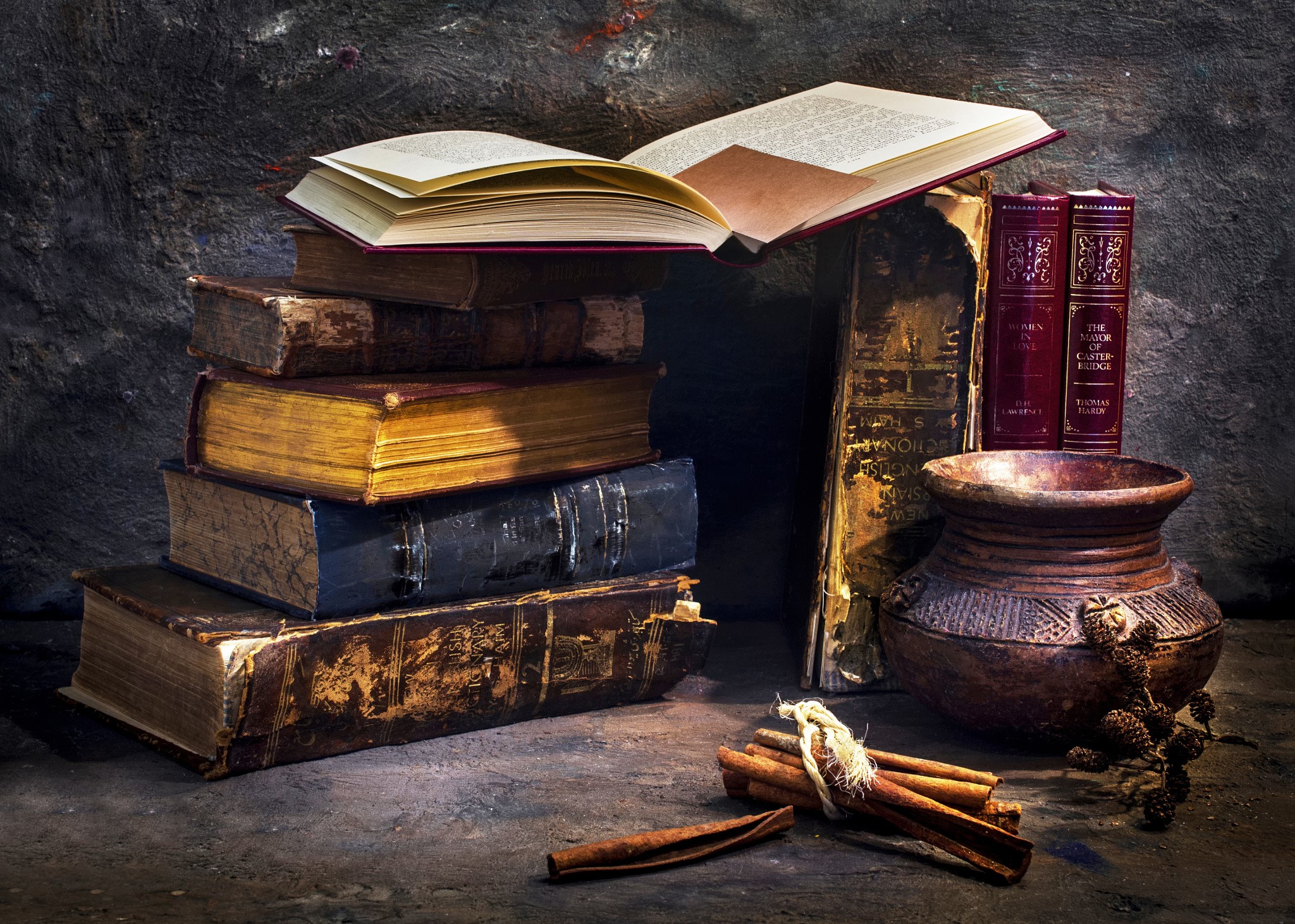 Stack of antique books and a jug container HD Wallpaper