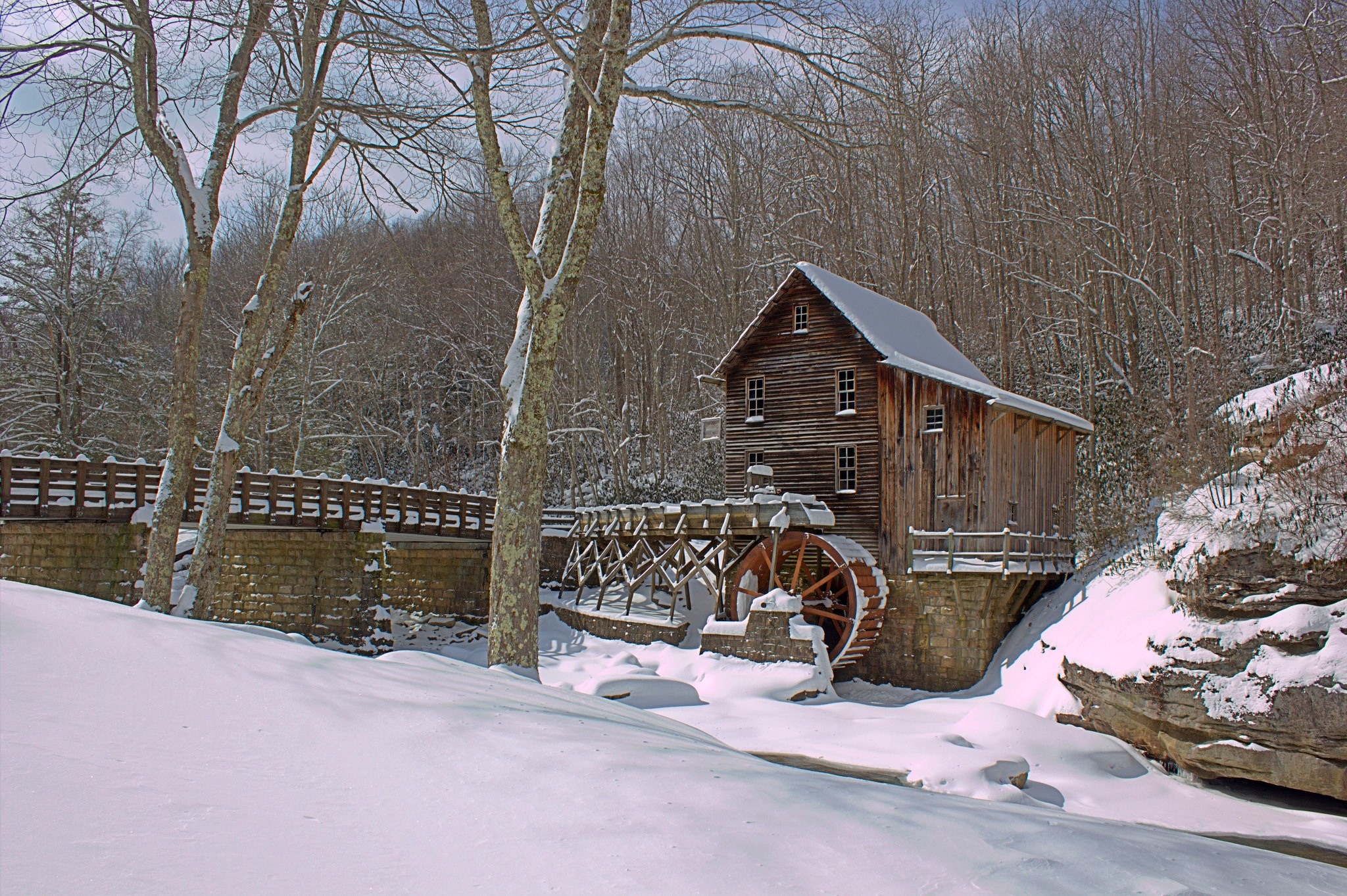 Watermill in a snowy forest landscape HD Wallpaper