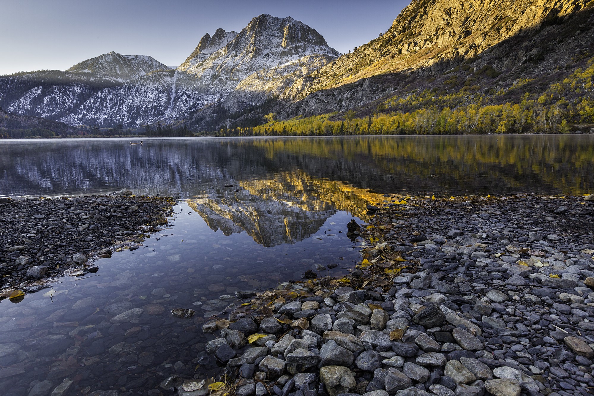 Lake and Mountains with Stones in Foreground HD Wallpaper
