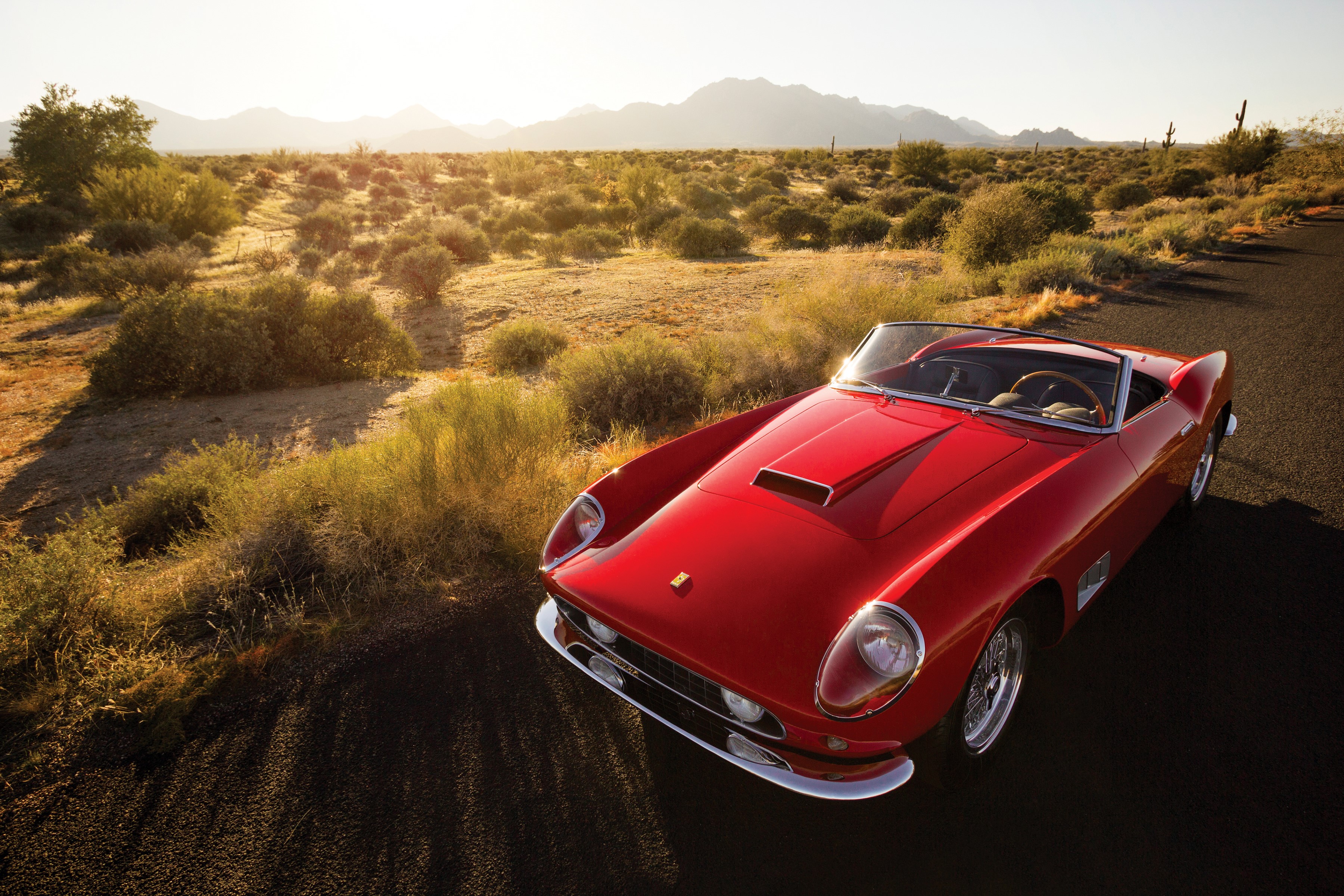 Red 1958 Ferrari 250 GT Spyder Passo Lungo in desert HD Wallpaper