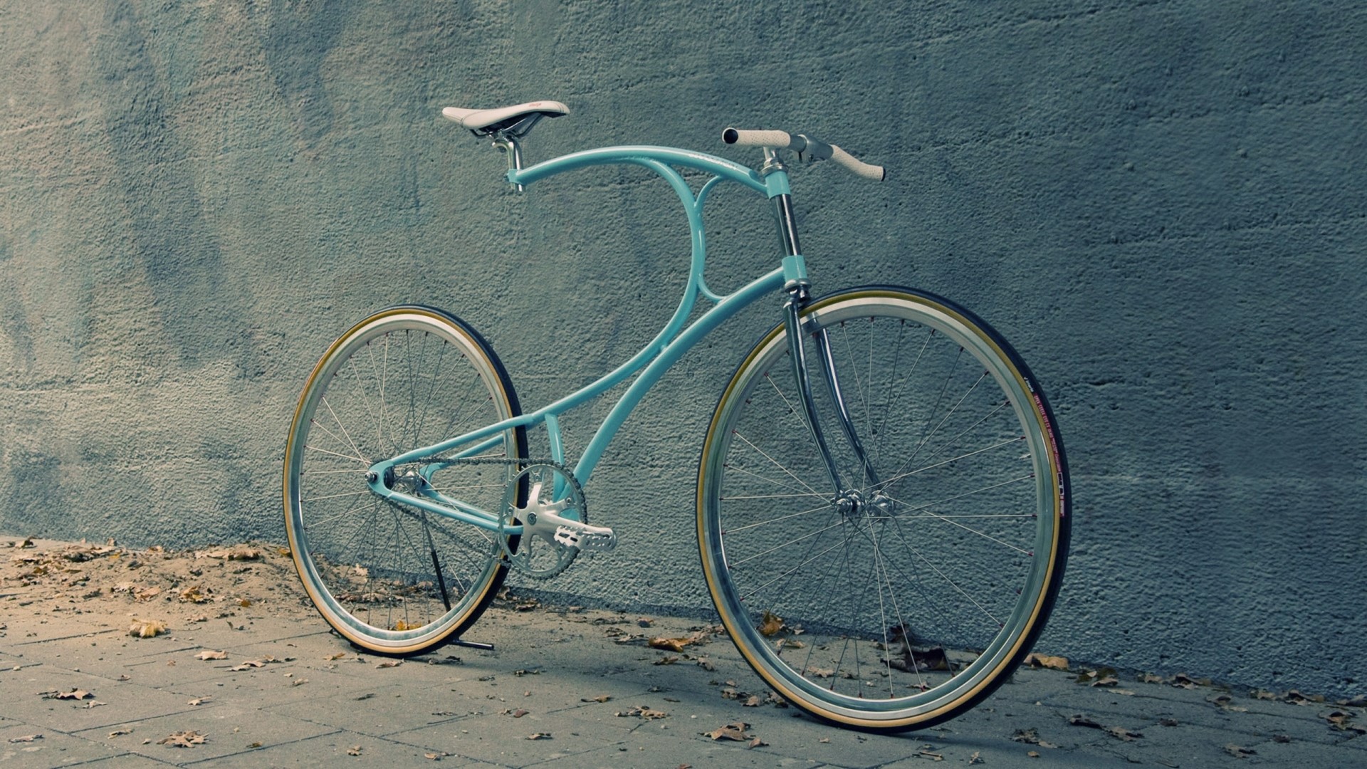 Light blue custom bicycle leaning against a wall HD Wallpaper