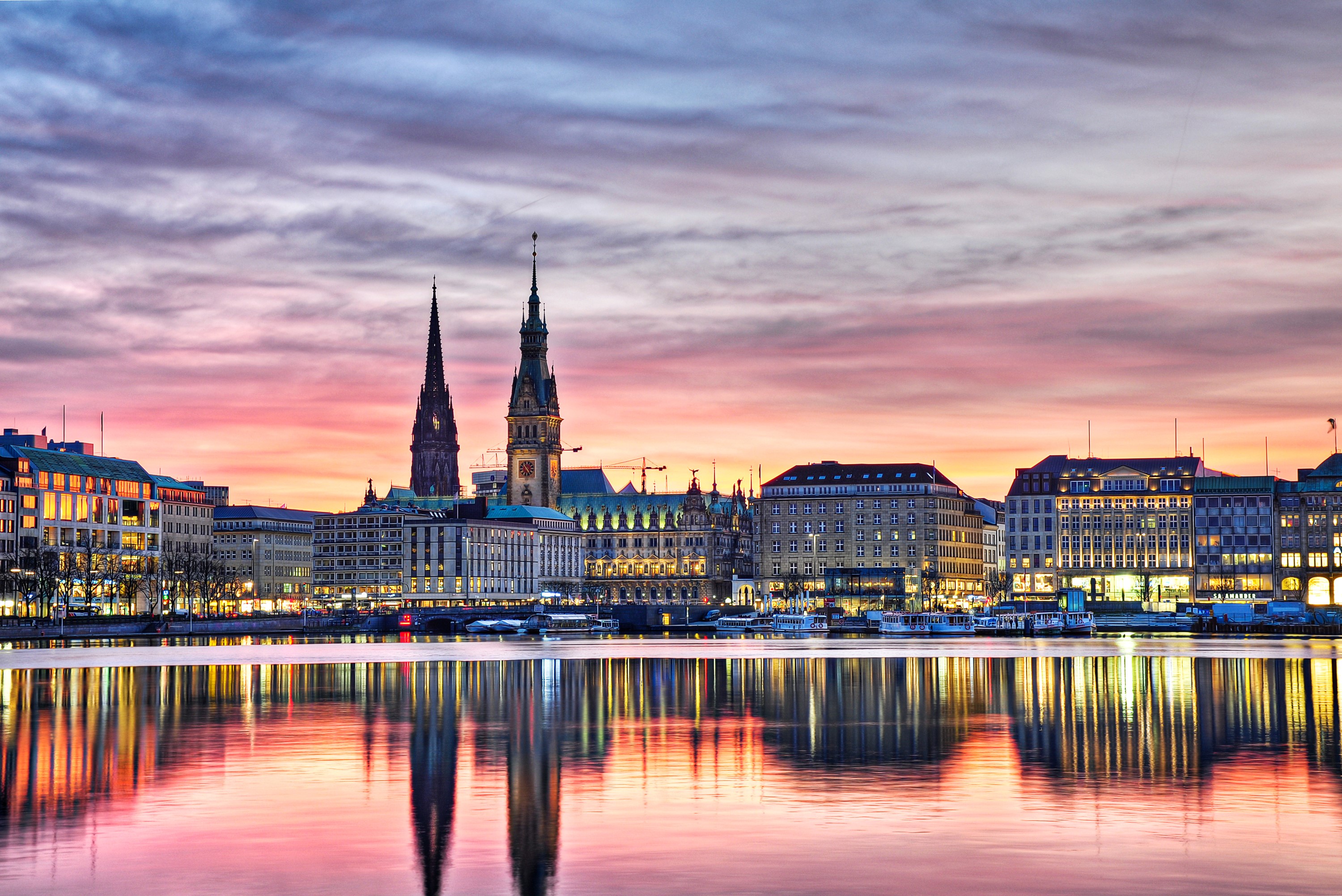 Hamburg skyline at sunset with river reflections HD Wallpaper