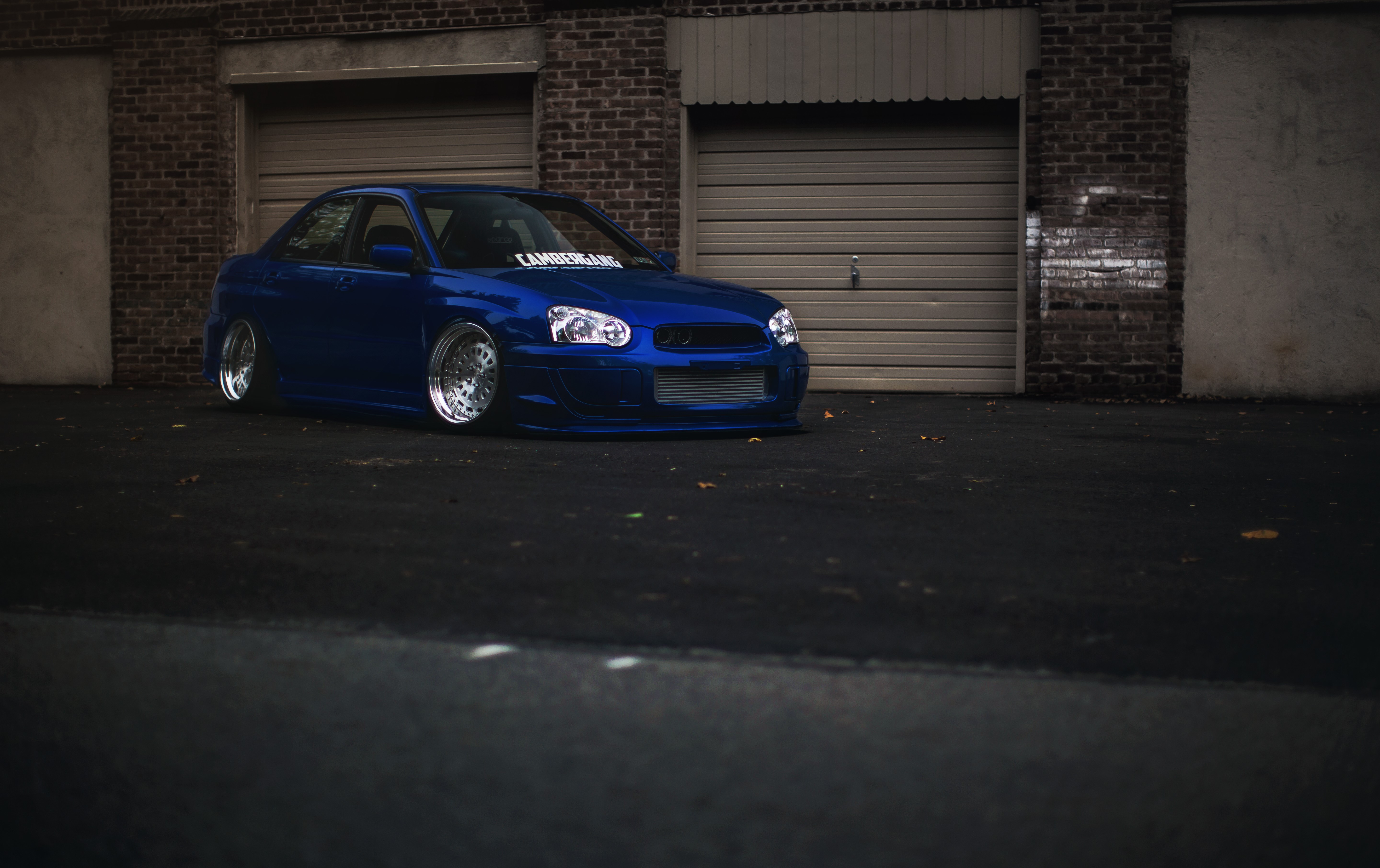Blue Subaru Impreza WRX STI parked HD Wallpaper