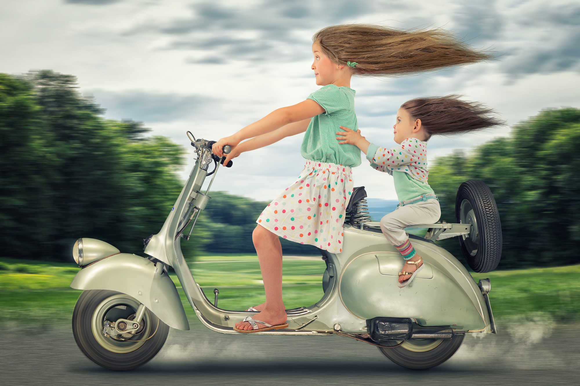 Two girls riding a vintage Vespa scooter HD Wallpaper