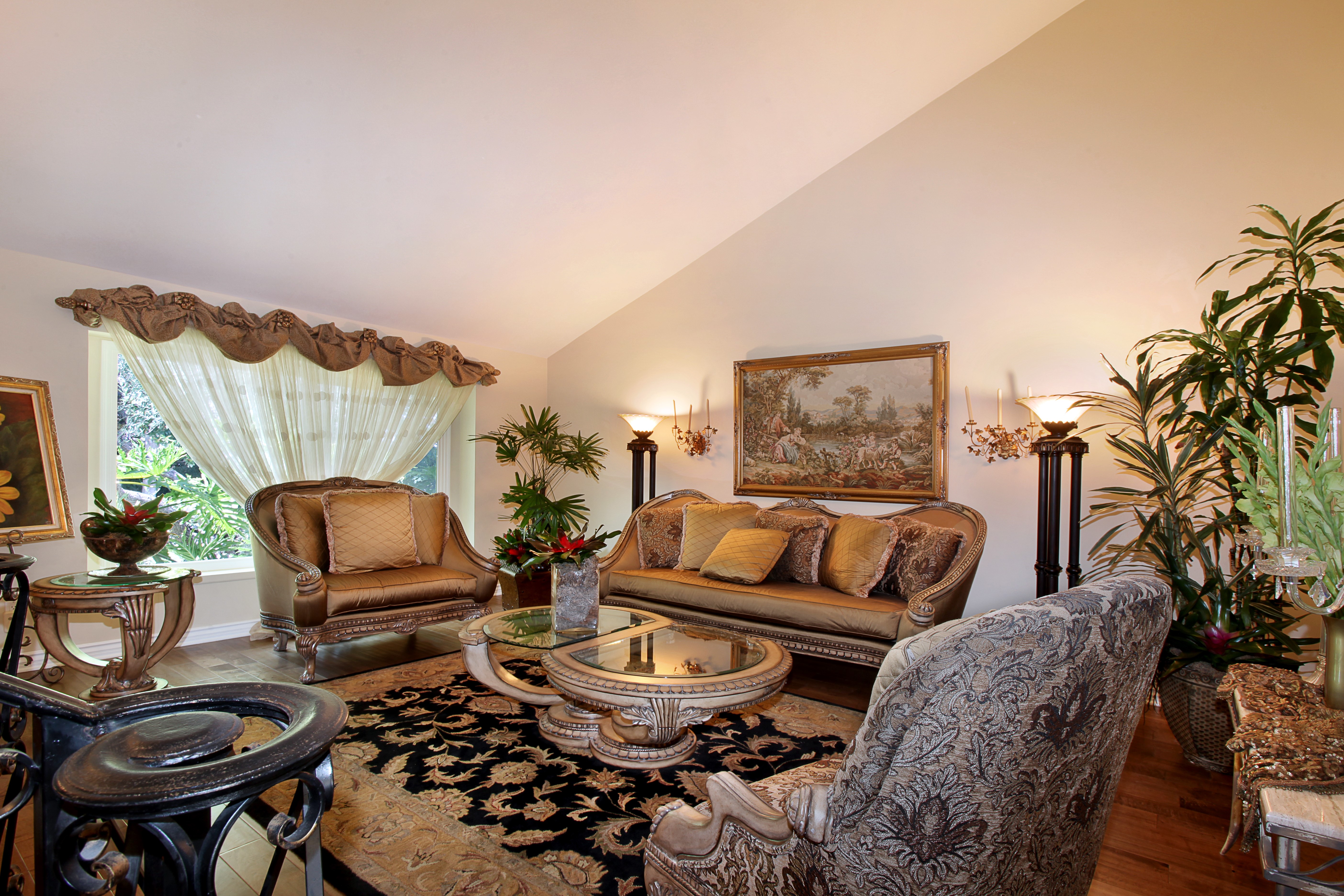 Living room with sofa, armchair, and carpet HD Wallpaper