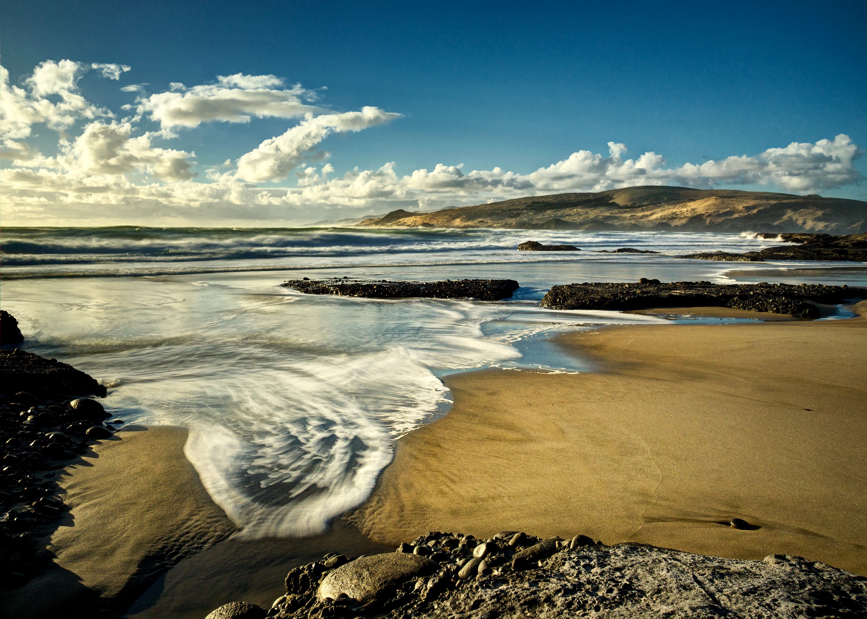 New Zealand Coastline with Rolling Hills and Clouds HD Wallpaper
